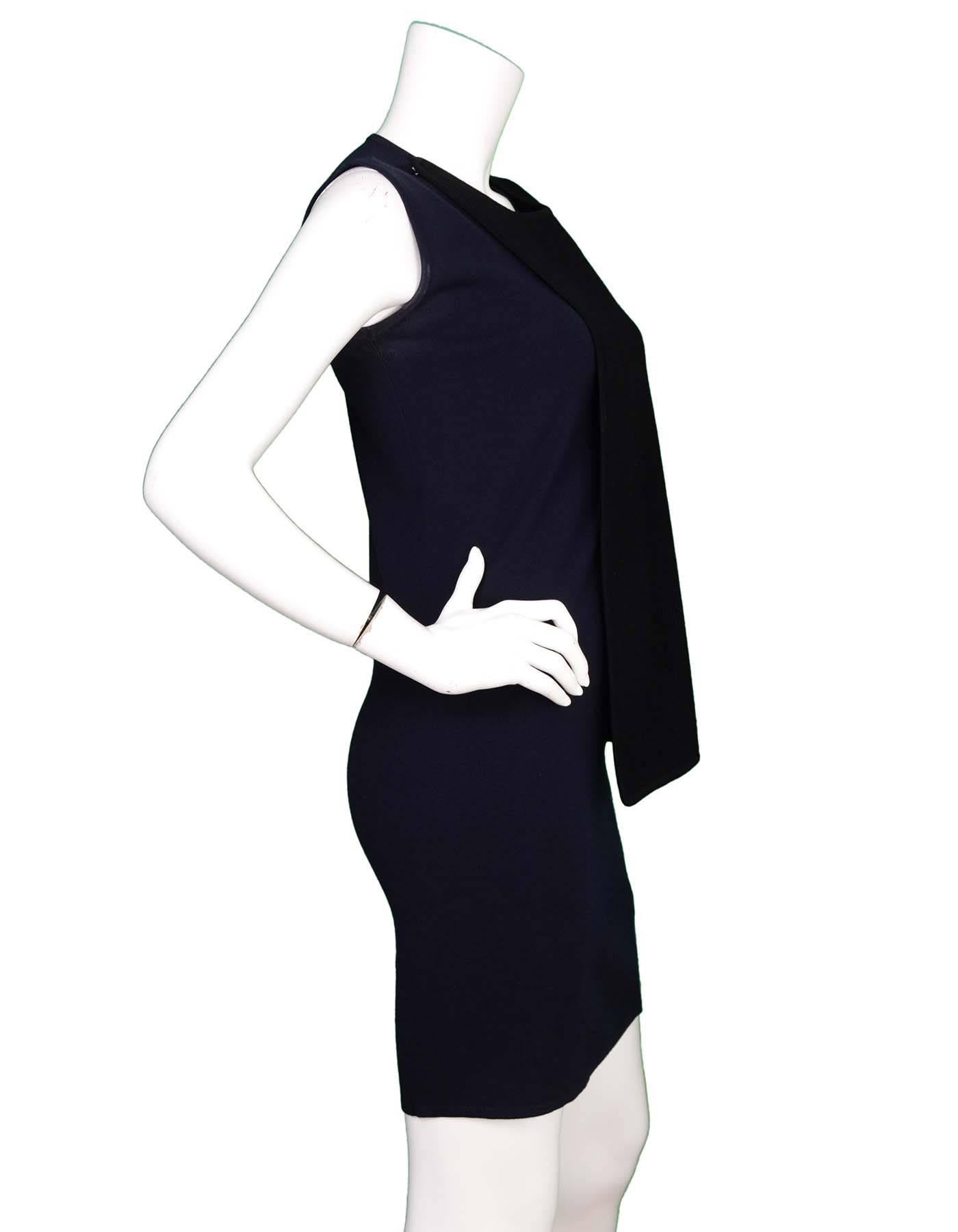 J.W. Anderson Navy and Black Panel Dress Sz XS

Made In: China
Color: Black, navy
Materials: 70% Viscose, 30% Polyester
Lining: None
Closure/Opening: Pull over
Exterior Pockets: None
Interior Pockets: None
Overall Condition: Excellent