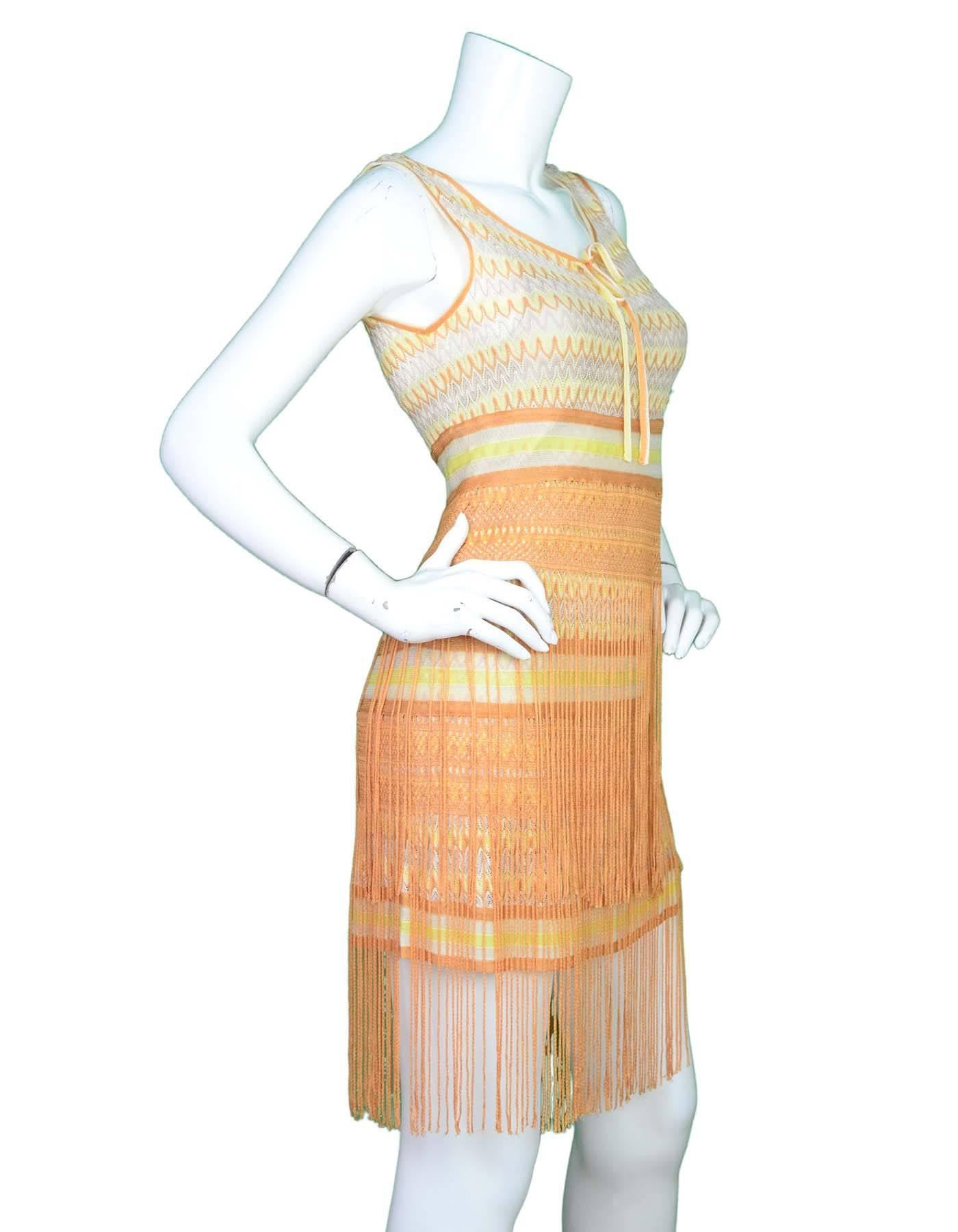 Missoni Yellow and Cream Fringe Dress Sz 40
Features beaded and sequin ball beads throughout

Made In: Italy
Color: Cream, yellow
Lining: Cream under slip
Closure/Opening: Hidden side zip closure
Exterior Pockets: None
Interior Pockets: