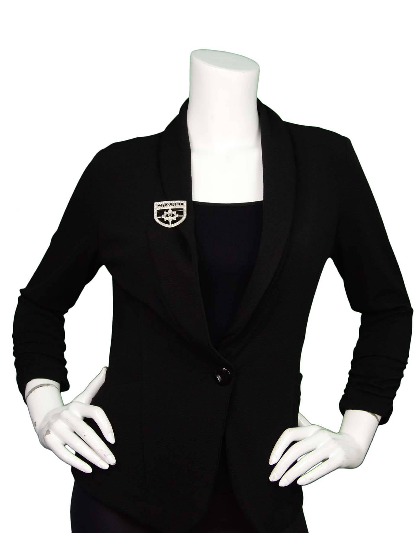 chanel badge brooch