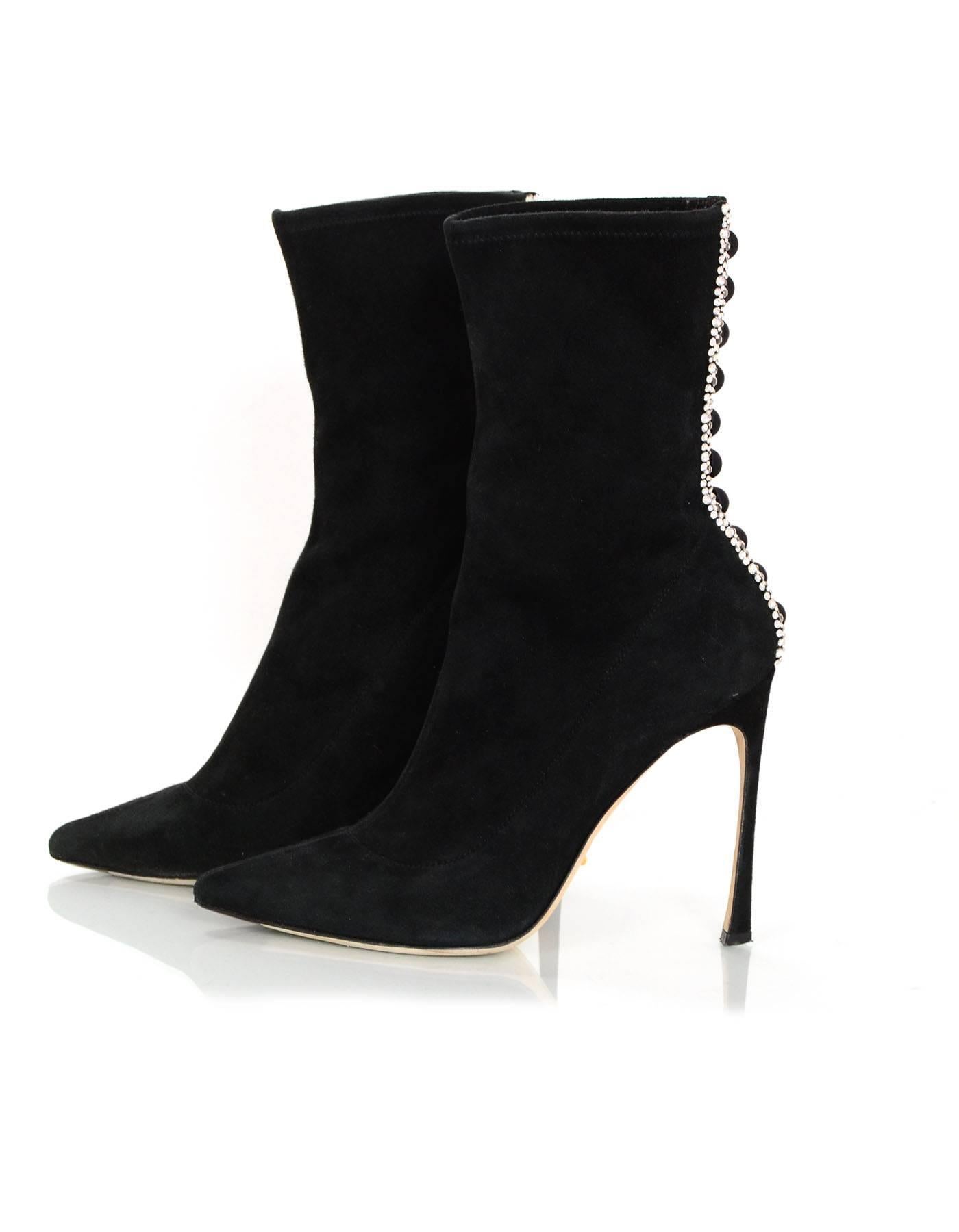 Sergio Rossi Black Suede Pointed Toe Boots 
Features crystal and silk button detailing at back of boots

Made In: Italy
Color: Black
Materials: Suede, crystal and silk
Closure/Opening: Pull on
Sole Stamp: Vero Cuoio Made in Italy 38