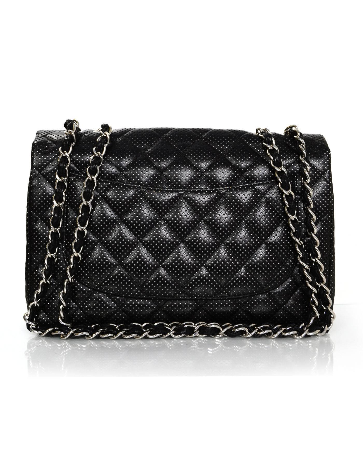 Chanel Black Perforated Jumbo Classic Flap Bag
Features adjustable shoulder strap

Made In: France
Year of Production: 2006
Color: Black
Hardware: Silvertone
Materials: Leather
Lining: Black leather
Closure/Opening: Single flap top with CC