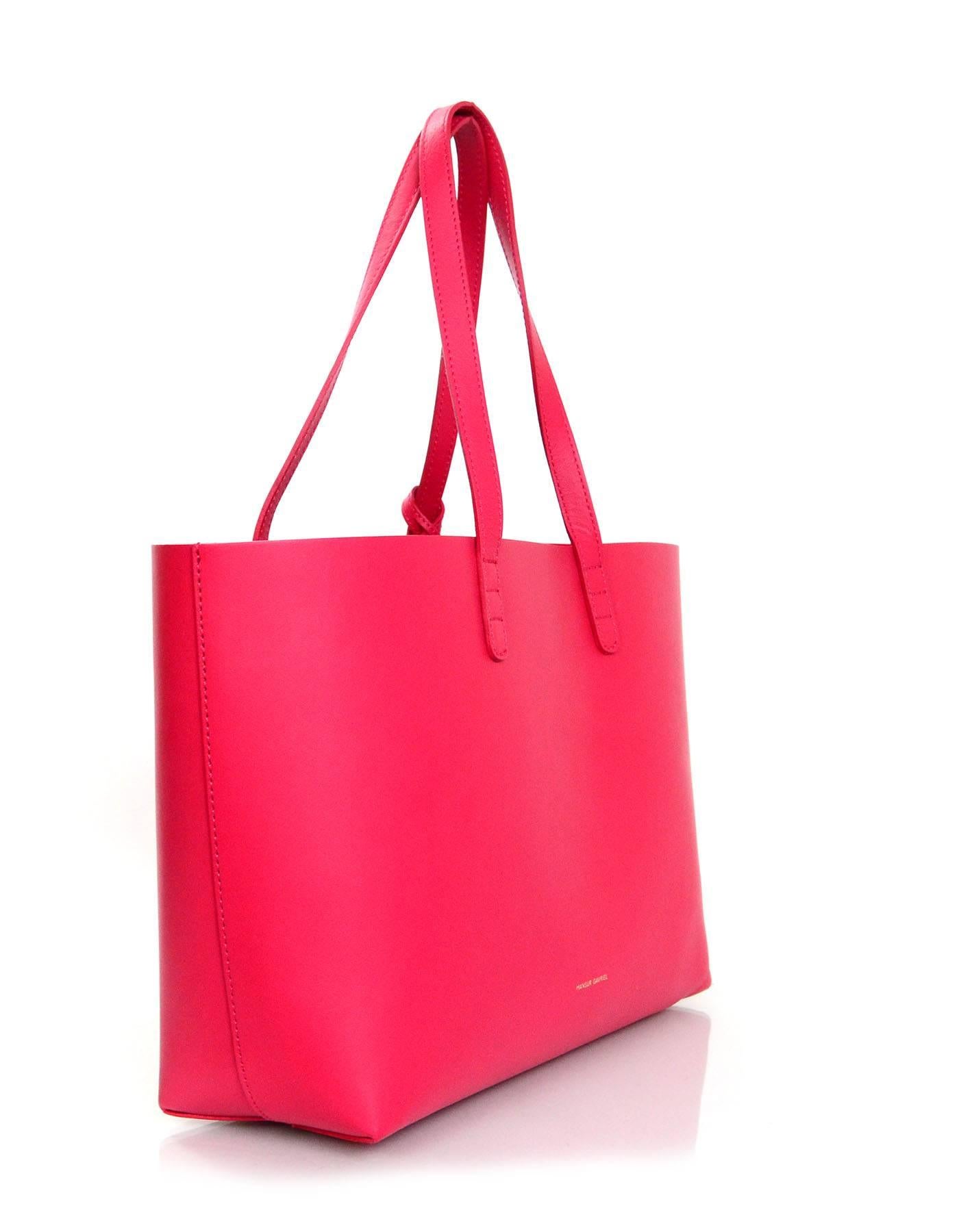 Mansur Gavriel Flama Red Calf Leather Small Tote 
Features matching red leather detachable insert

Made In: Italy
Color: Red
Hardware: Goldtone
Materials: Calf leather
Lining: Red calf leather
Closure/Opening: Open top
Exterior Pockets:
