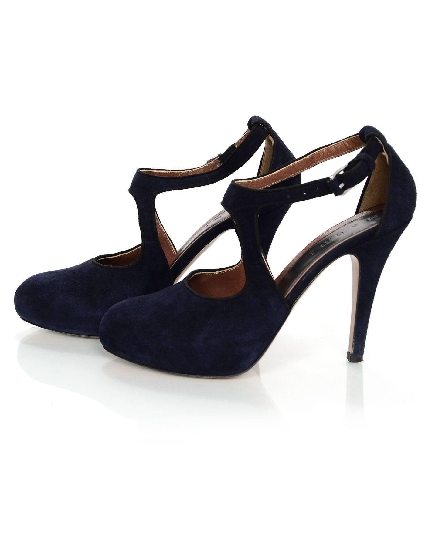 Marni Navy Suede Pumps Sz 38
Features hidden front platform

Made In: Italy
Color: Navy
Materials: Suede
Closure/Opening: Buckle closure at ankle
Sole Stamp: Vero Cuoio Made in Italy 38
Overall Condition: Excellent pre-owned condition with