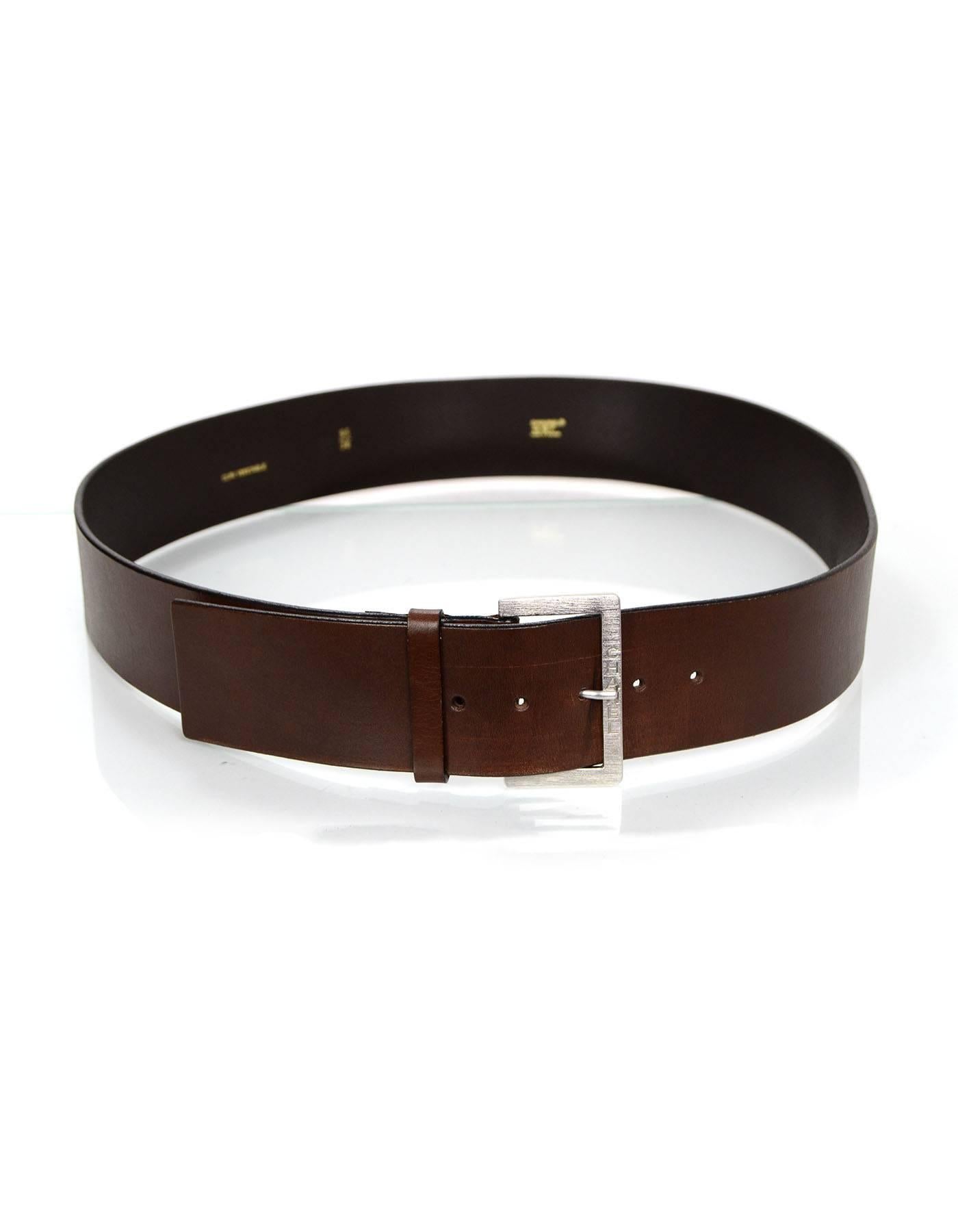 Chanel Brown Leather Belt 

Made In: France
Year of Production: 2002
Color: Brown
Hardware: Silvertone
Materials: Leather and metal
Closure/Opening: Buckle and notch closure
Stamp: 02 CC P
Overall Condition: Excellent pre-owned condition