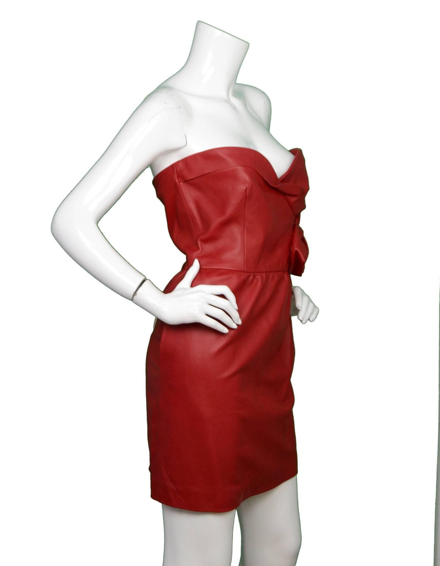 Valentino NWT Red Leather Strapless Dress 
Features red leather flower detail at waist
Made In: Italy
Color: Red
Composition: 100% lambskin
Lining: Nude, 100% silk
Closure/Opening: Side zipper
Exterior Pockets: Two hip pockets
Interior