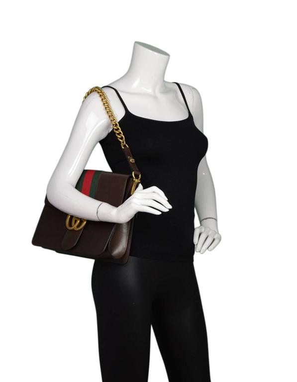 black gucci bag with green and red stripe