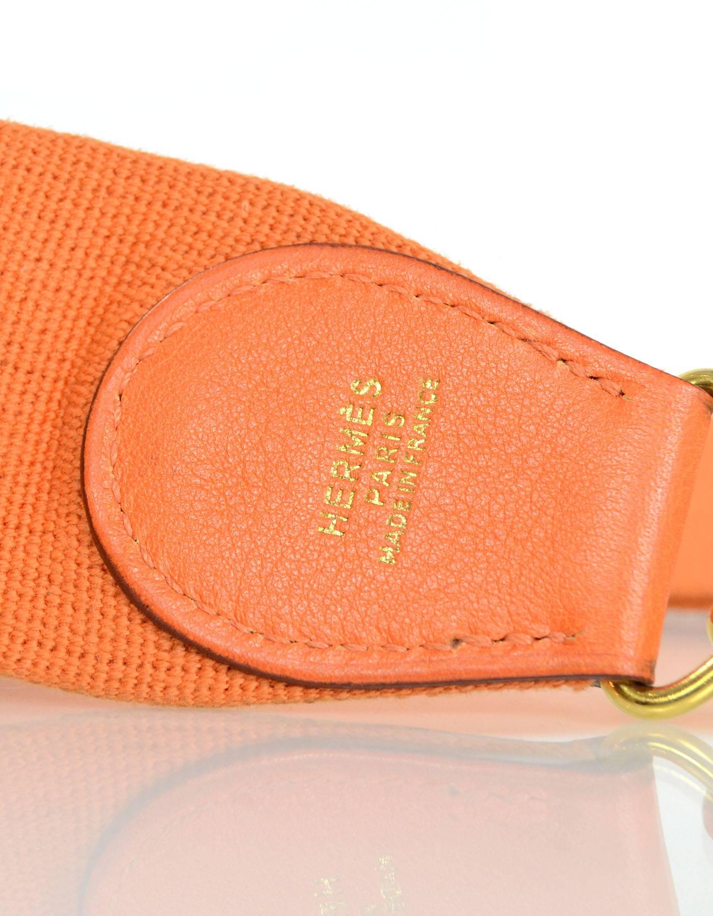 Hermes Orange Canvas & Leather Bag Strap 

Made In: France
Color: Orange
Materials: Leather and canvas
Closure/Opening: Two swivel hook closures on either side
Stamp: HS40 (on inside of hardware)
Overall Condition: Excellent pre-owned