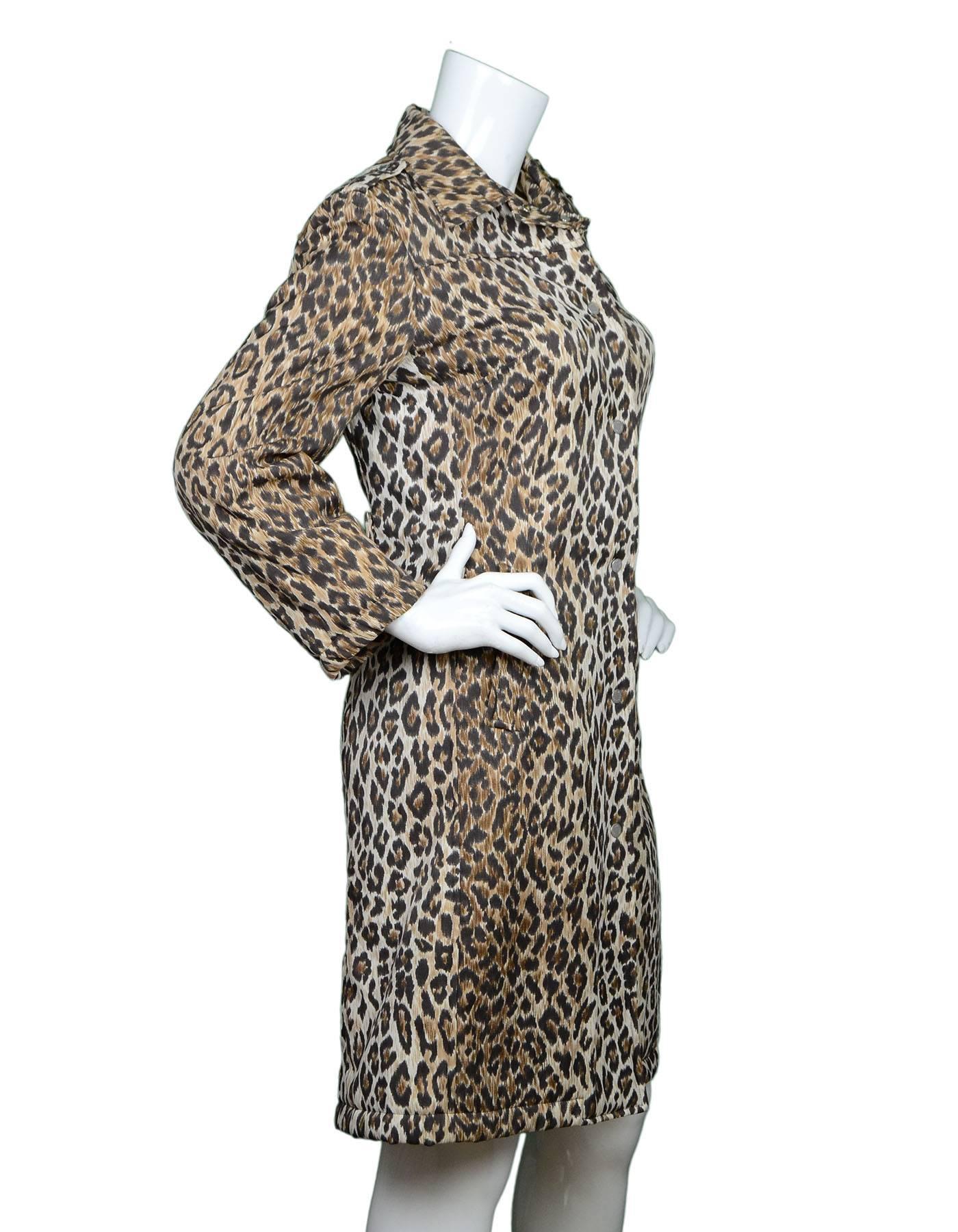 Dolce & Gabbana Leopard Print Peacoat
Features detachable strap at back waist

Made In: Italy
Color: Brown and tan leopard print
Composition: 62% polyester, 38% cotton
Lining: Yellow 100% polyester
Closure/Opening: Front snap down