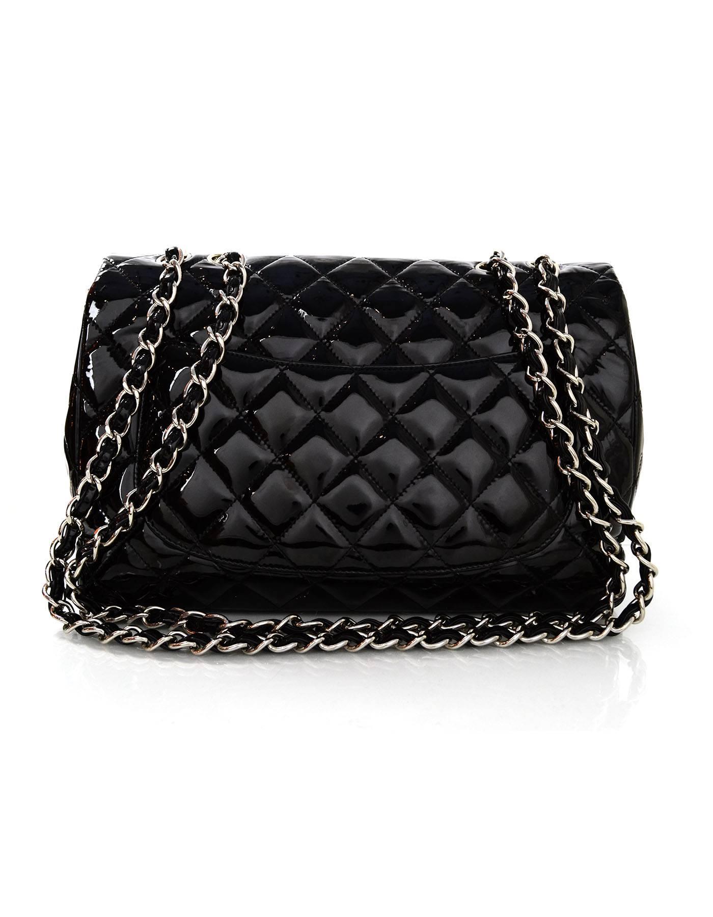 Chanel Black Quilted Patent Jumbo Classic Flap Bag
Features adjustable shoulder strap

Made In: Italy
Year of Production: 2010
Color: Black
Hardware: Silvertone
Materials: Patent leather
Lining: Black leather
Closure/Opening: Flap top with
