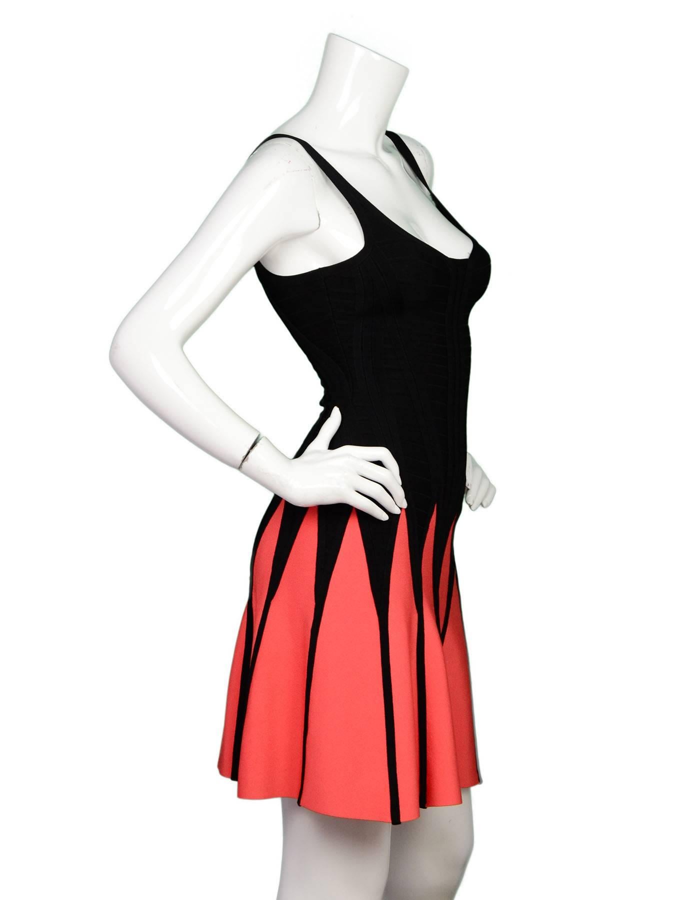 Herve Leger Black & Coral Fit-Flare Bandage Dress 
Made In: China
Color: Black and coral/orange
Composition: 90% rayon, 9% nylon, 1% spandex
Lining: None
Closure/Opening: Back center zip up
Exterior Pockets: None
Interior Pockets:
