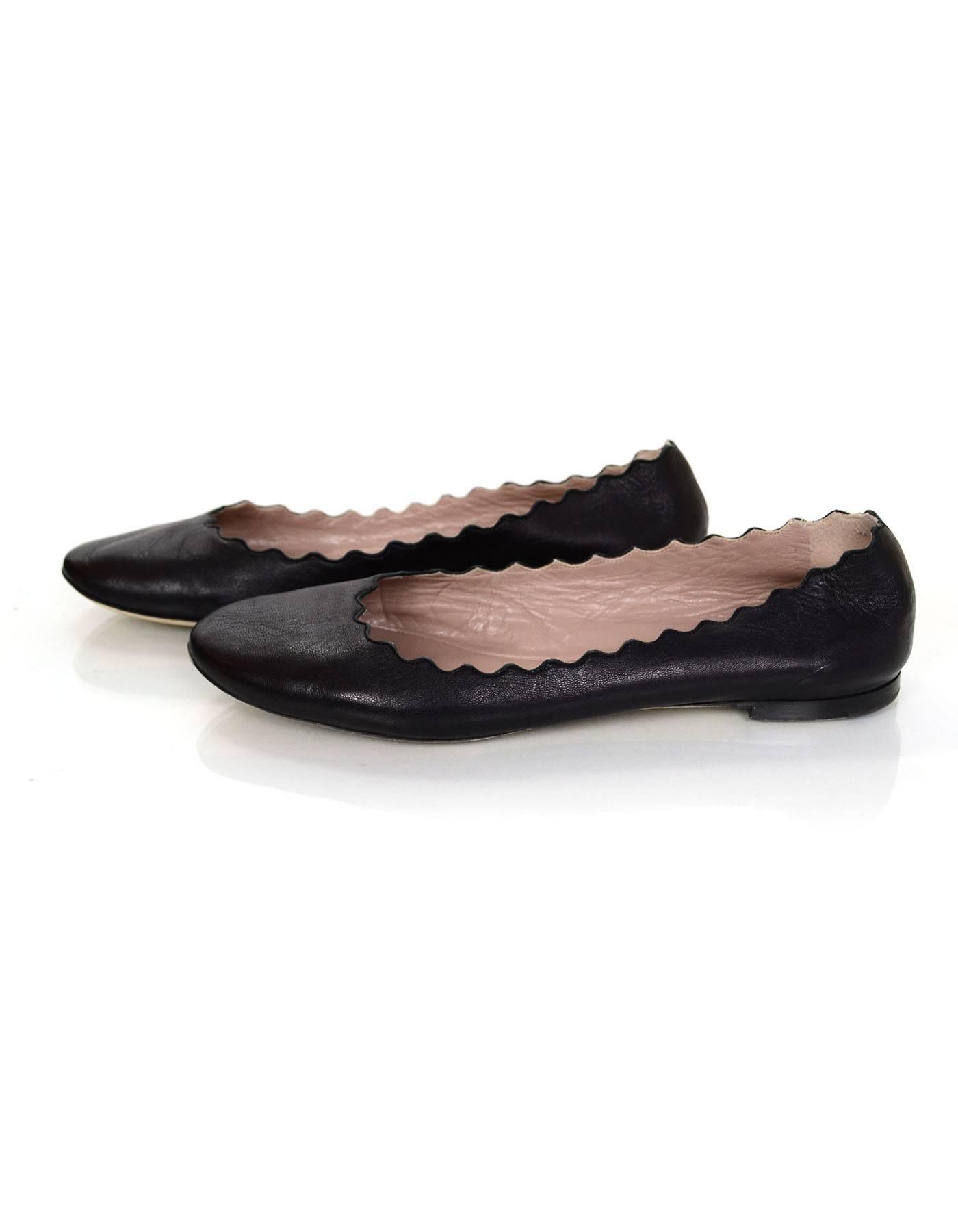 100% Authentic Chloe black leather Lauren flats sz 40 with scalloped trim
Made In: Italy
Color: Black
Materials: Leather
Closure: Slip on
Sole Stamp: Chloe Made in Italy 40
Retail Price: $475 + tax
Overall Condition: Excellent pre-owned