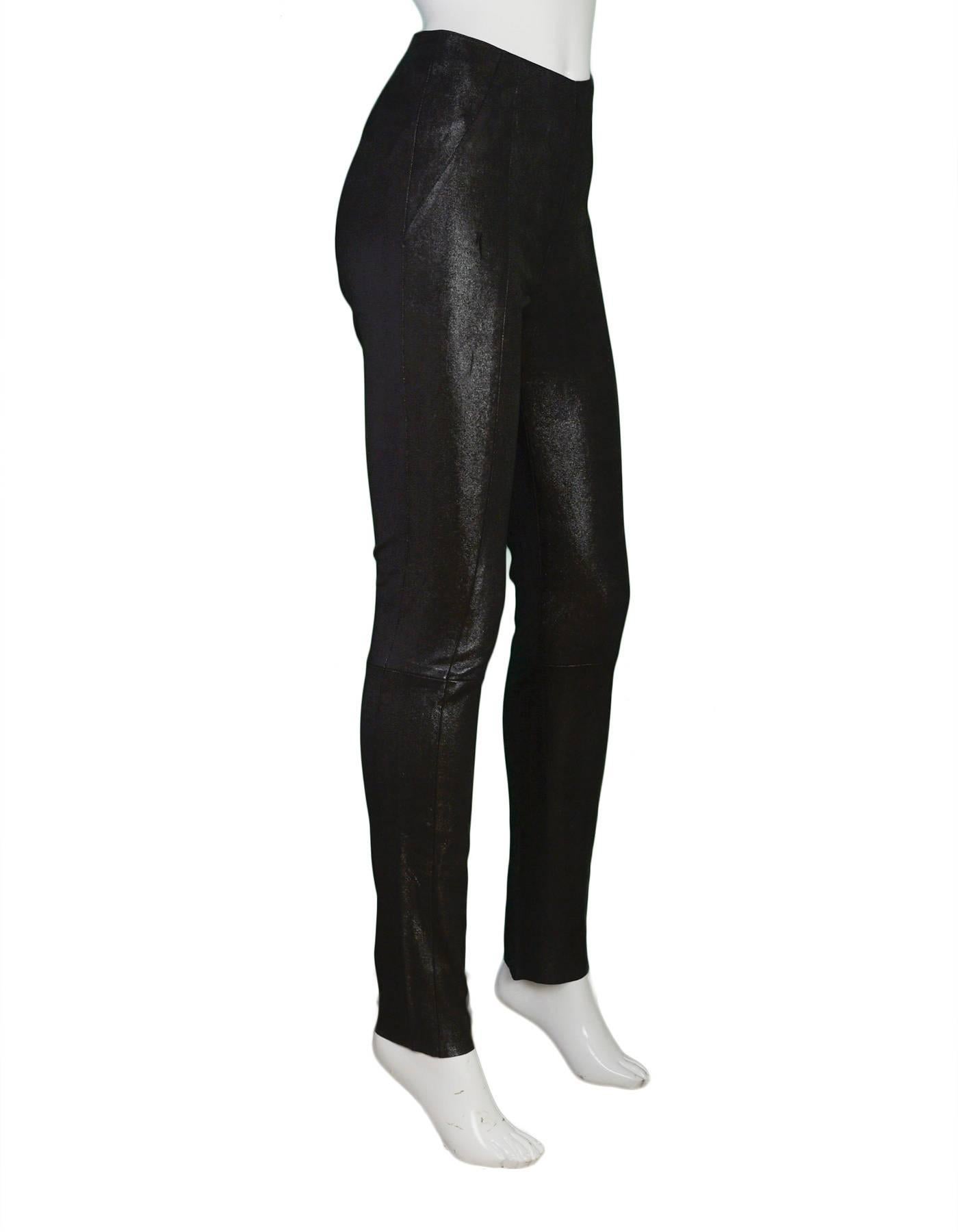 Drome Black Iridescent Skinny Pants 
Features raw edges at pant hemlines

Made In: Italy
Year of Production: 2013-2014
Color: Iridescent black
Composition: 100% leather
Lining: None
Closure/Opening: Hip side zip up
Exterior Pockets: