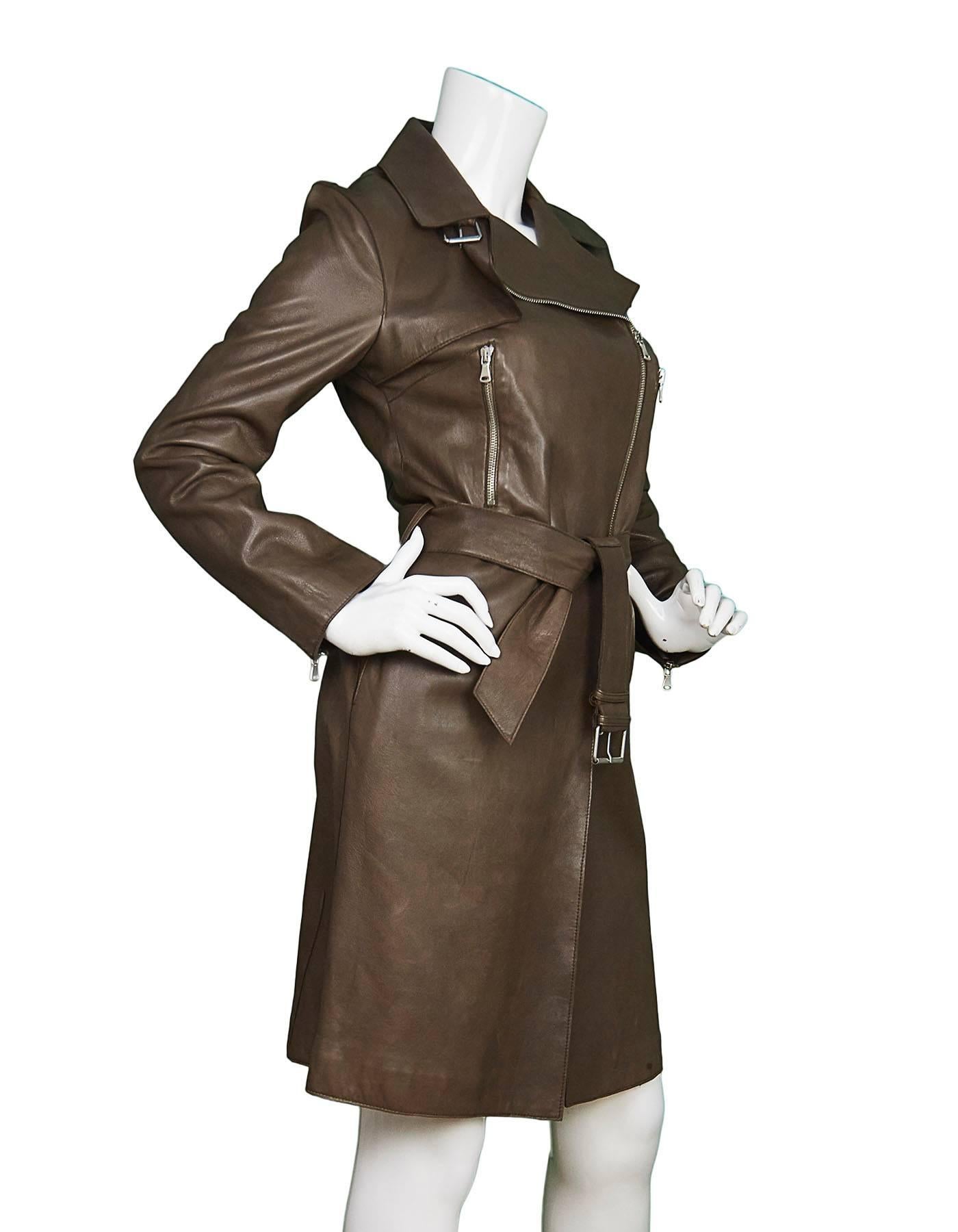 Joseph Brown Leather Trench Coat 
Features brown leather waist tie

Made In: Italy
Color: Brown
Composition: 100% lambskin
Lining: Charcoal, wool
Closure/Opening: Double zip up closure
Exterior Pockets: Two zipper pockets and two hip slit