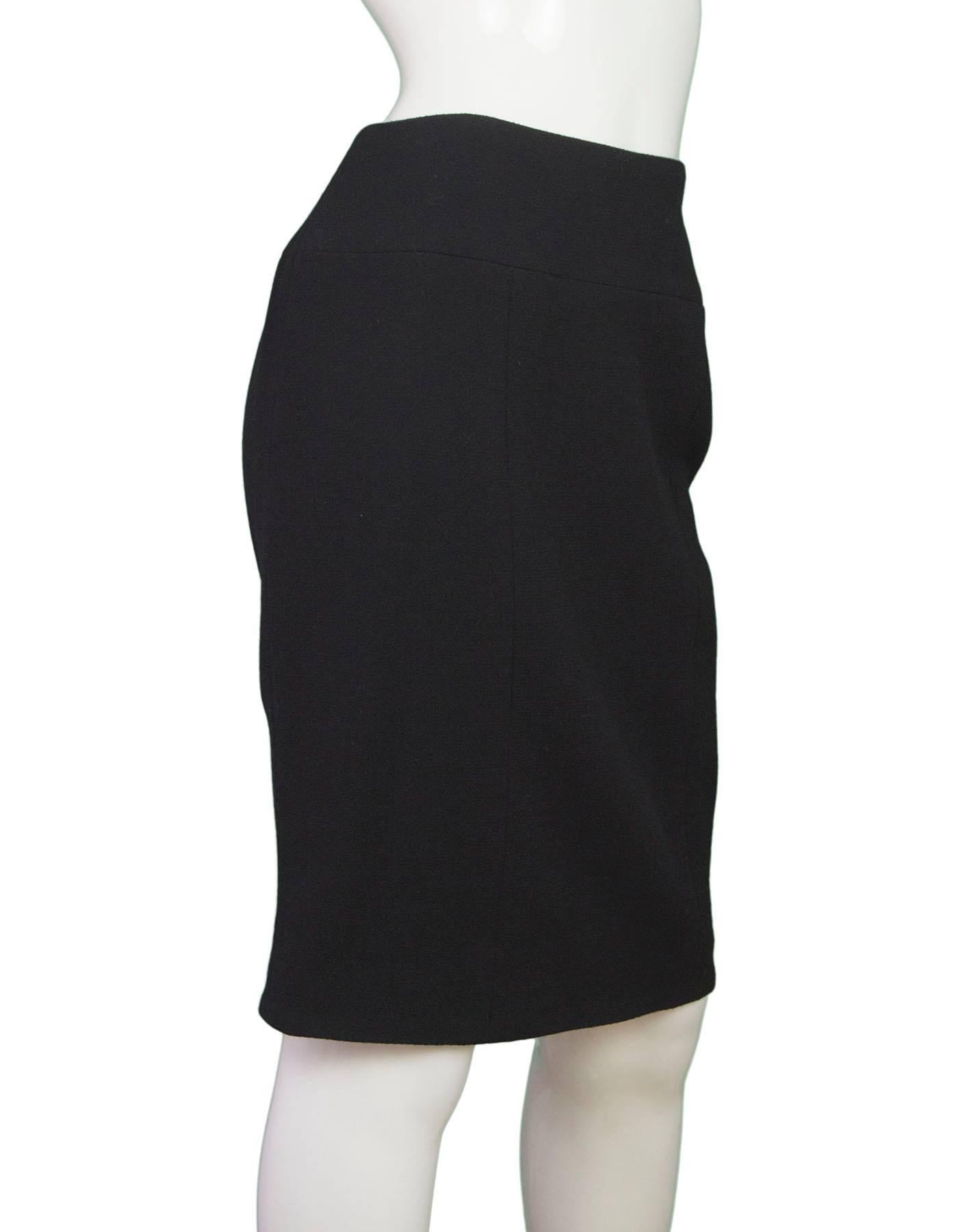 Chanel Black Wool Pencil Skirt 

Made In: France
Year of Production: 1996
Color: Black
Composition: 100% wool
Lining: Black, 95% silk, 5% lycra
Closure/Opening: Back center zipper closure with hook and eye closure
Exterior Pockets: