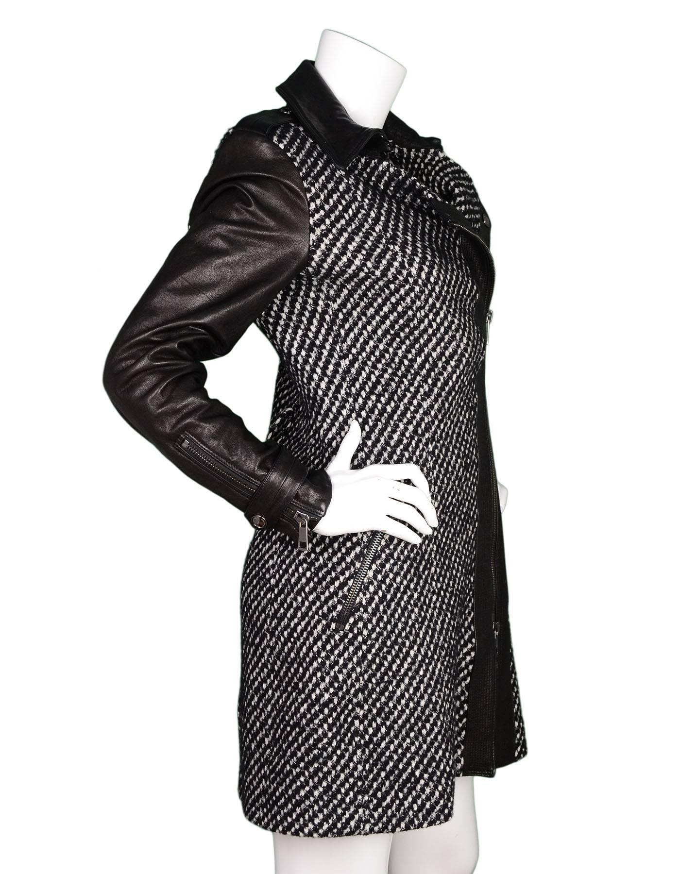 Burberry London Houndstooth & Leather Long Coat 
Features asymmetric zip up front detail.  
**Please note this coat is missing its belt**

Made In: Hungary
Color: Black and white
Composition: Leather trim, houdstooth- 60% wool, 40%