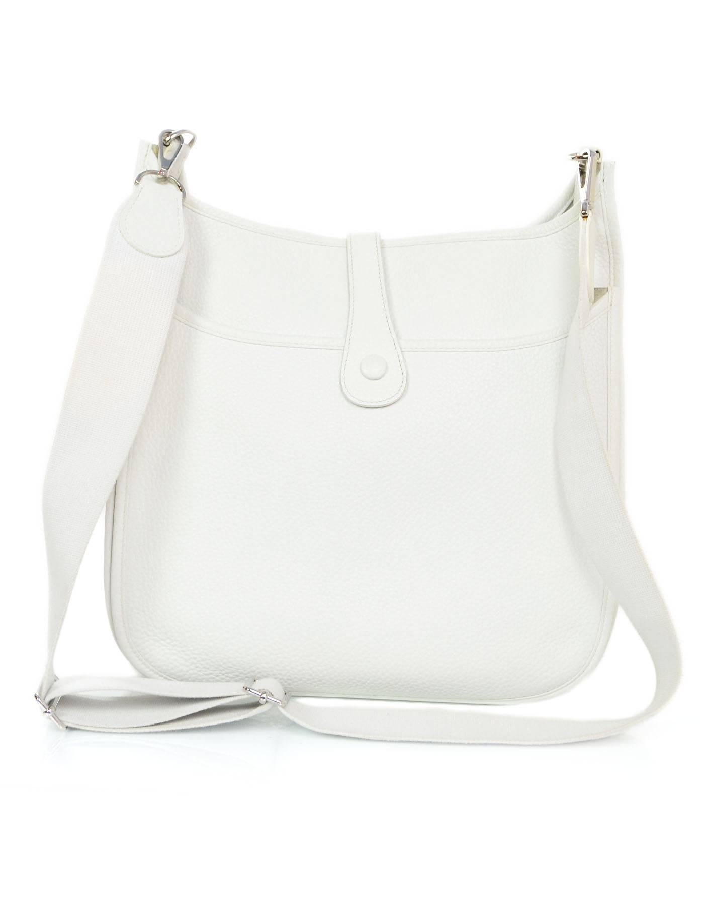 Hermes White Clemence Evelyne III GM Messenger Bag
Features perforated H logo and adjustable shoulder/crossbody strap

Made In: France
Year of Production: 2009
Color: White
Hardware: Palladium
Materials: Clemence leather
Lining:
