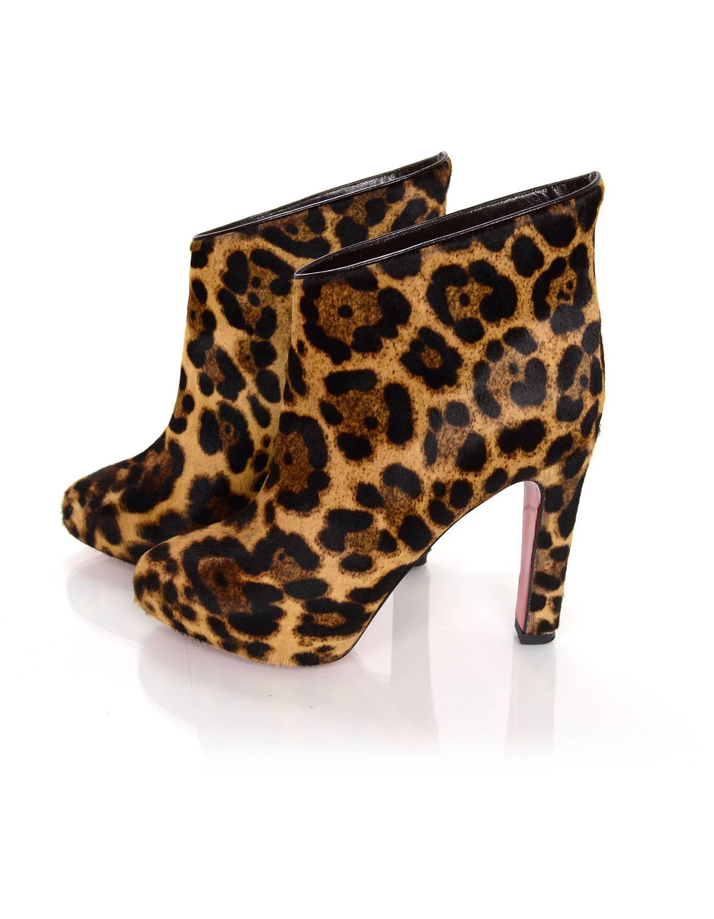 Christian Louboutin Leopard Print Calfskin KST 120 Ankle Booties 
Features hidden platform

Made In: Italy
Color: Black and tan
Materials: Calfskin (ponyhair)
Closure/Opening: Pull on
Sole Stamp: Christian Louboutin Made in Italy 37