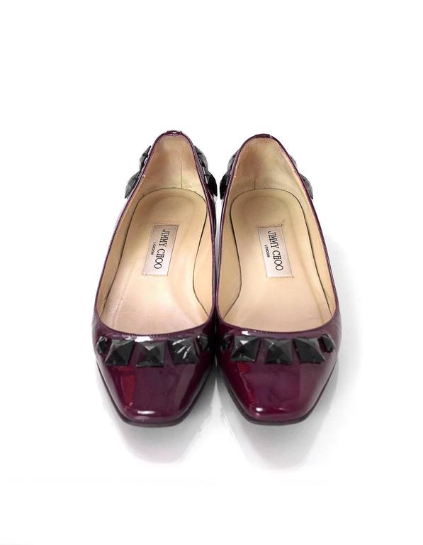 red jimmy choo flats