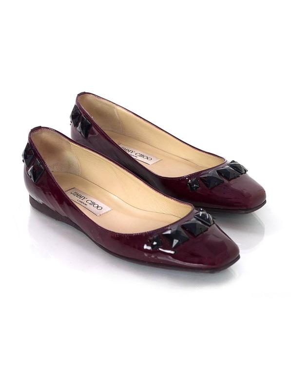 red jimmy choo flats