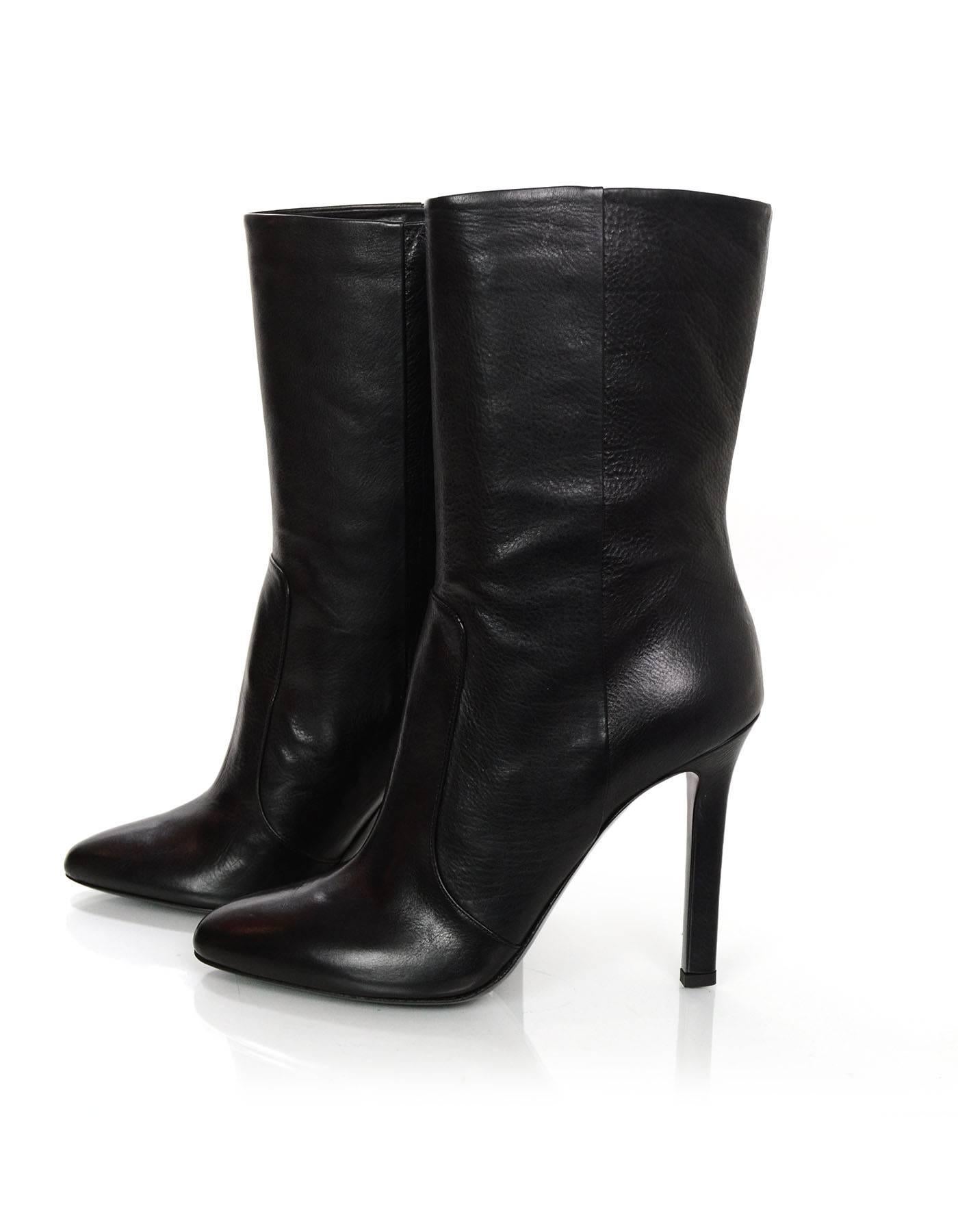 Tamara Mellon NEW Black Leather Rebel Boots 

Made In: Italy
Color: Black
Materials: Leather
Closure/Opening: Pull on
Sole Stamp: 37 made in italy TAMARA MELLON
Overall Condition: Excellent- like new
Includes: Tamara Mellon box, dust bag and