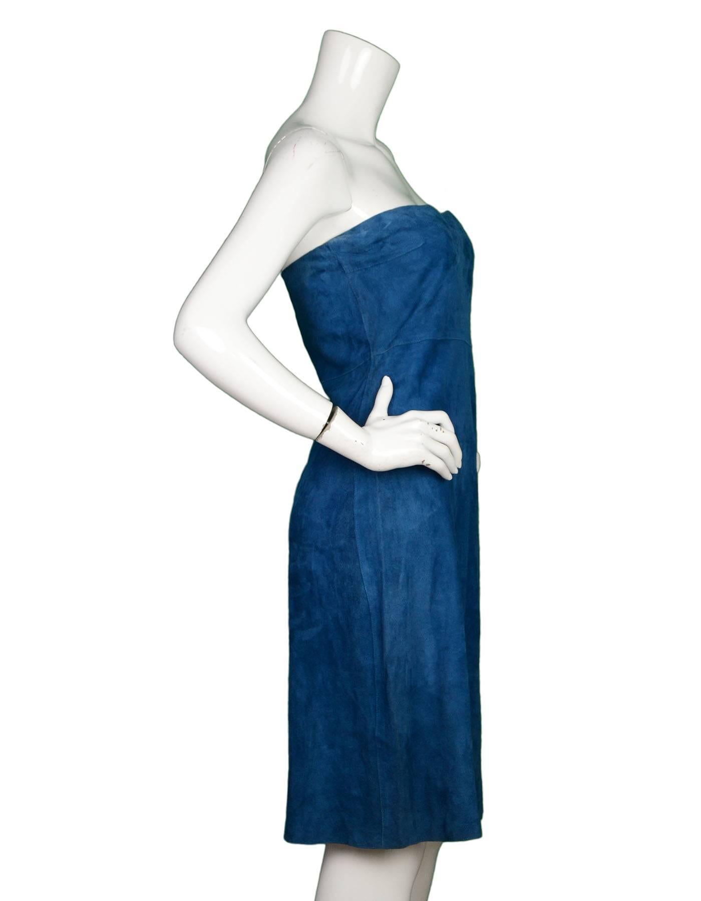 Tahari Blue Suede Strapless Dress

Made In: China
Color: Aqua blue
Composition: 100% leather
Lining: None
Closure/Opening: Back center zipper
Exterior Pockets: None
Interior Pockets: None
Overall Condition: Excellent pre-owned condition