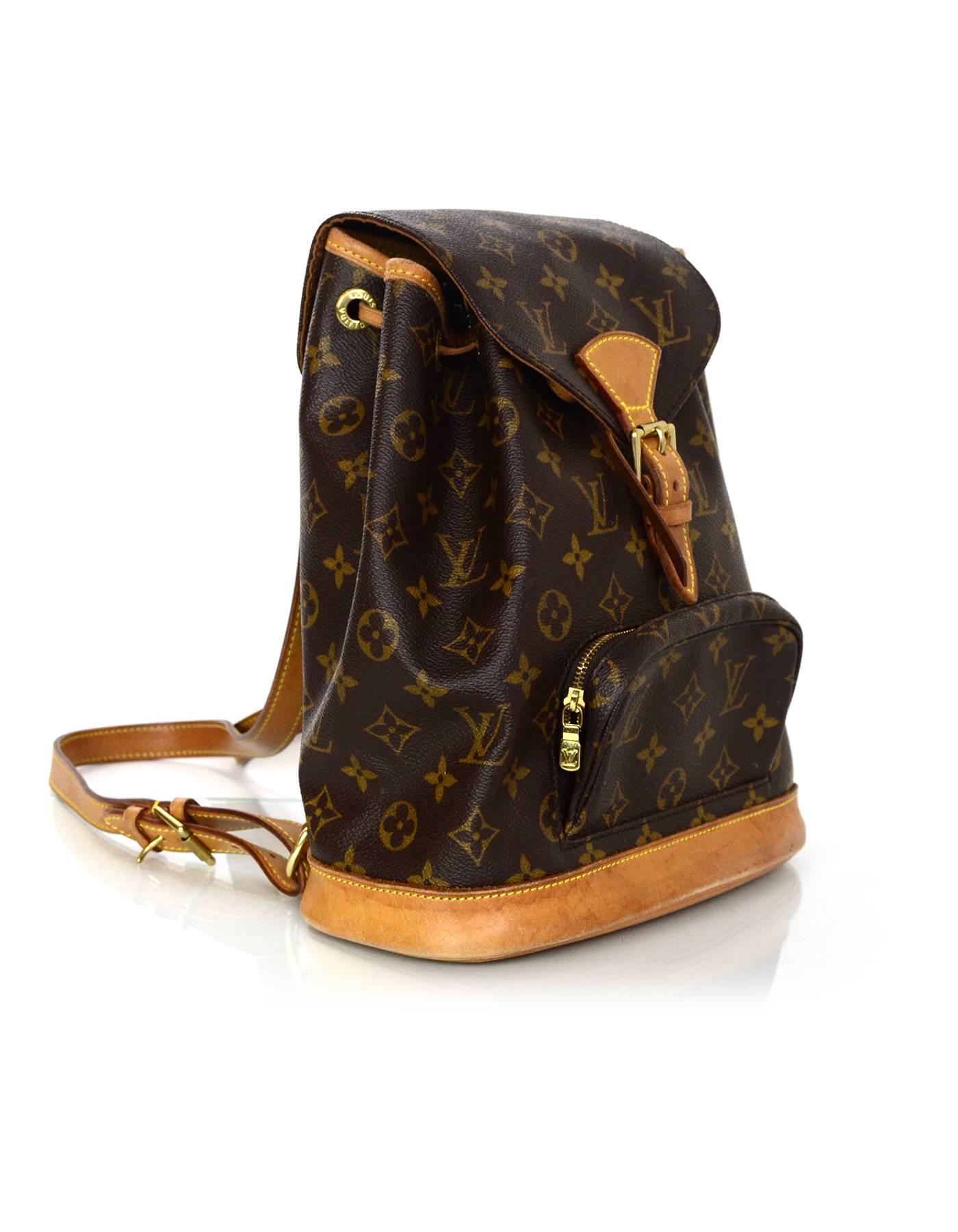 Louis Vuitton Monogram Montsouris MM Backpack
Features leather trim throughout and adjustable shoulder straps

Made In: France
Year of Production: 1997
Color: Brown
Hardware: Goldtone
Materials: Leather and coated canvas
Lining: Brown