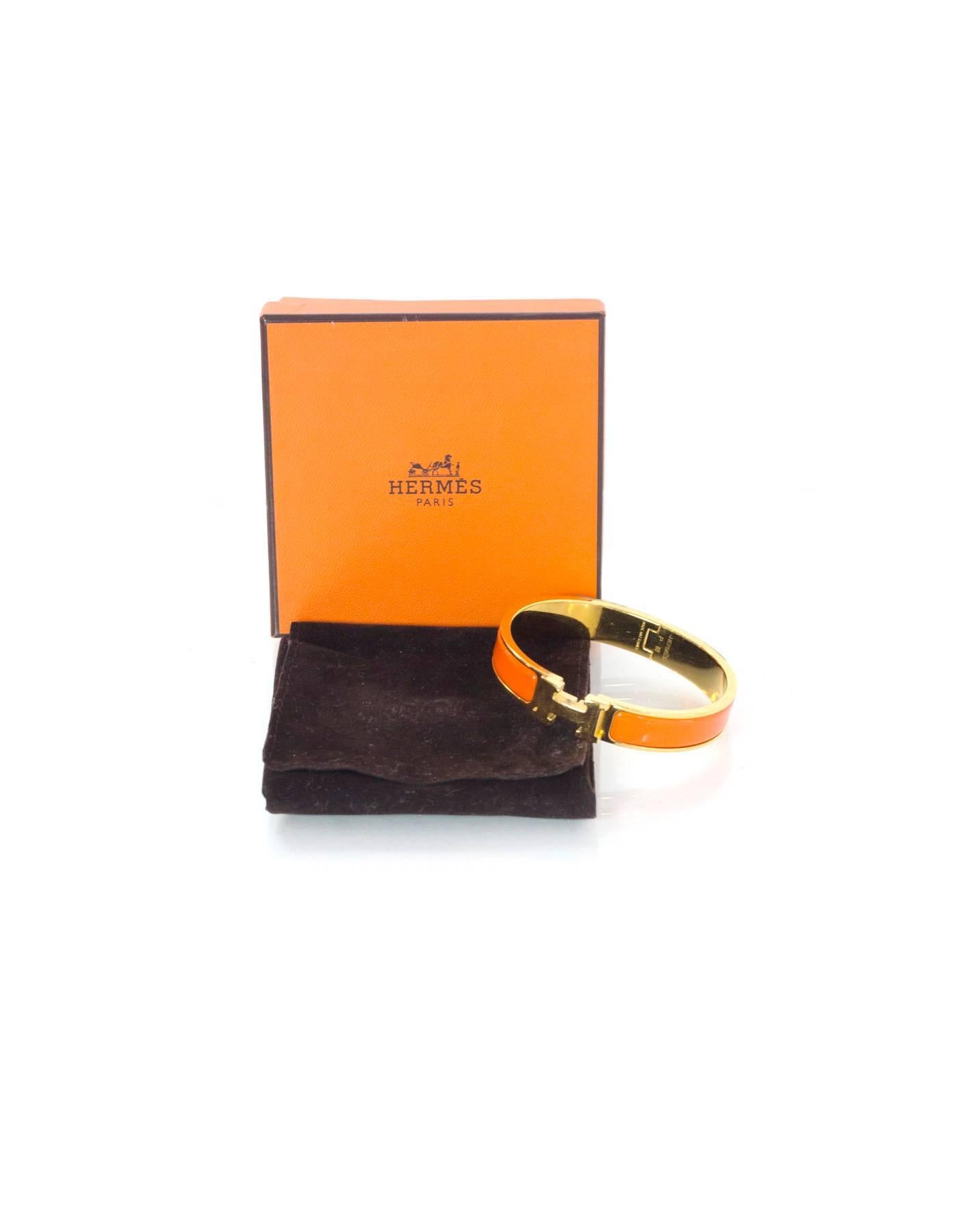 Hermes Orange Enamel & Gold H Clic Clac GM Bangle Bracelet In Excellent Condition In New York, NY