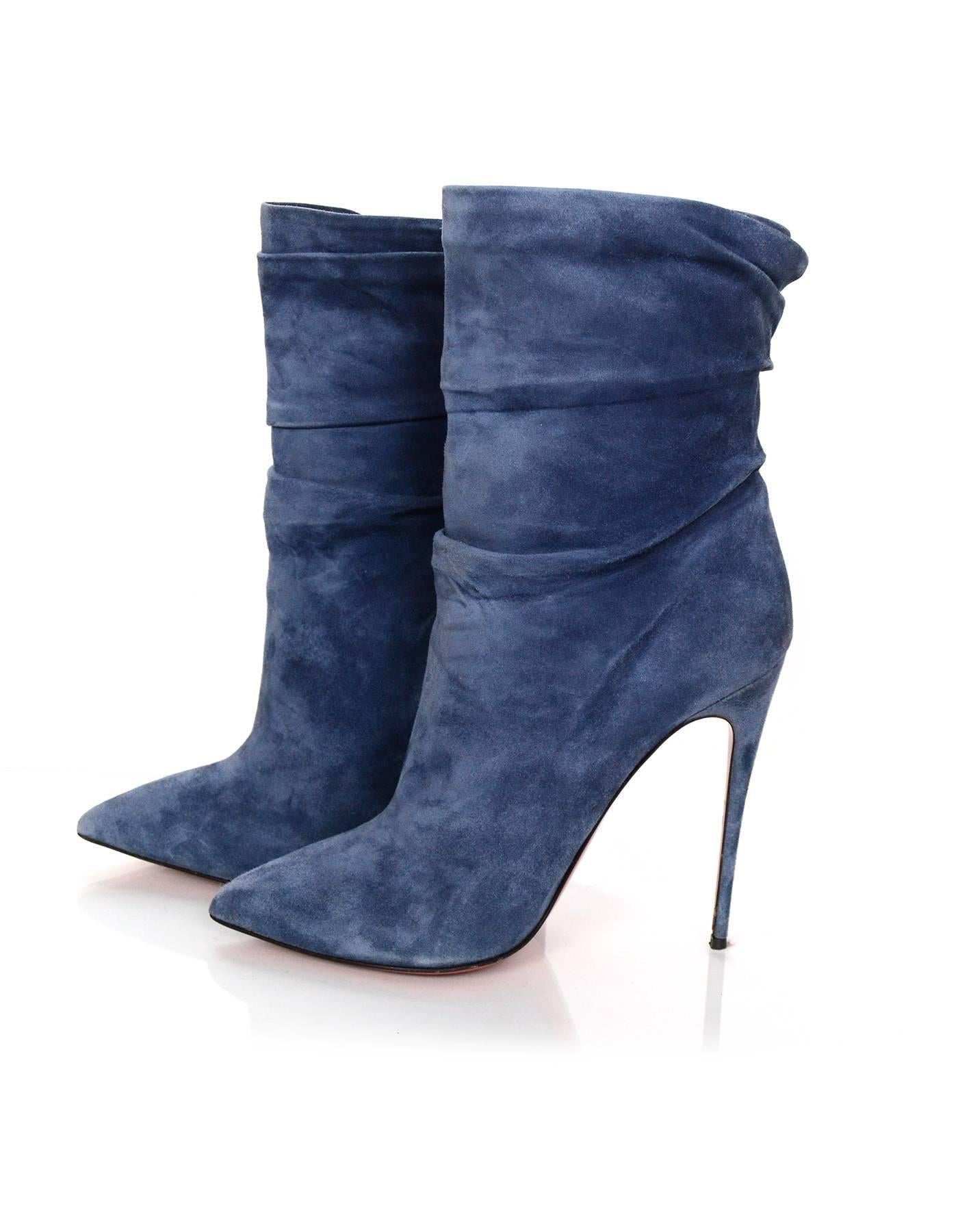 Christian Louboutin Blue Suede Short Boots 
Features ruching at shaft

Made In: Italy
Color: Blue
Materials: Suede
Closure/Opening: Pull on
Sole Stamp: Christian Louboutin Made in Italy 41
Overall Condition: Excellent pre-owned condition with the