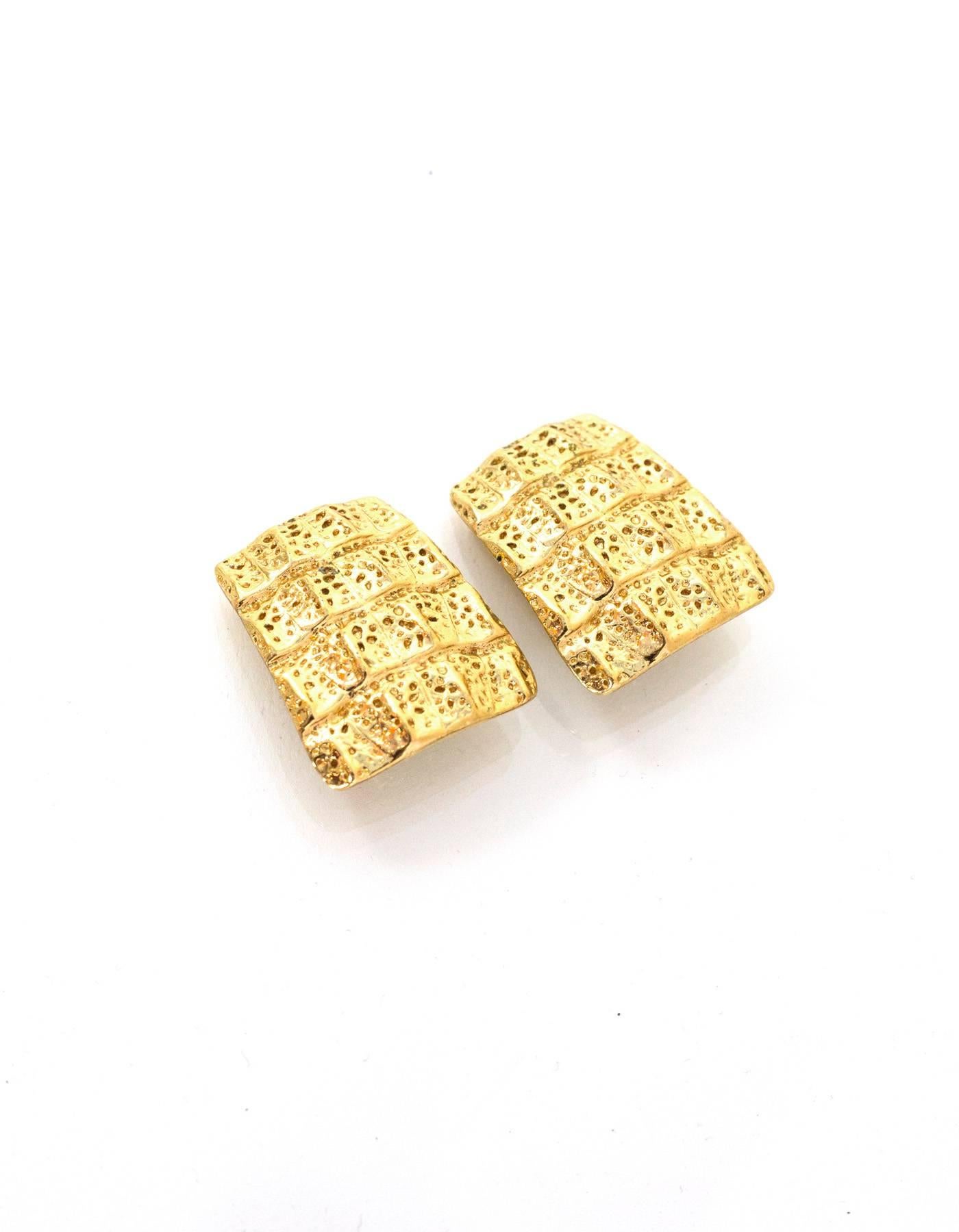 YSL Vintage Gold Rectangle Clip On Earrings 
Features textured details

Made In: France
Year of Production: Cira 1980s
Color: Goldtone
Materials: Metal
Closure: Clip on back
Overall Condition: Excellent vintage, pre-owned condition with the
