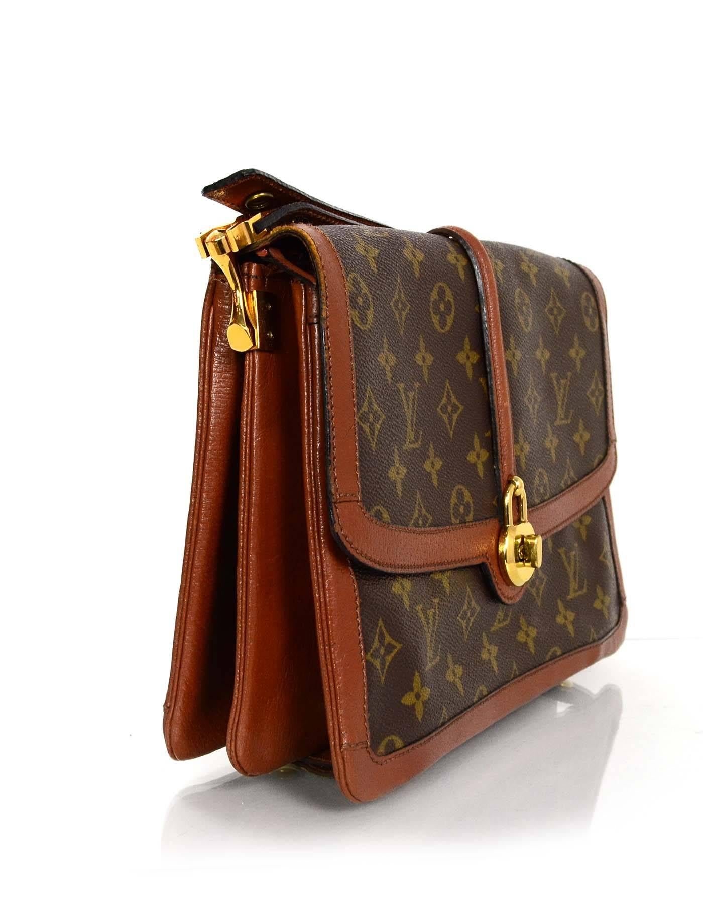Louis Vuitton Vintage Monogram Flap Bag
Features leather trim throughout exterior and adjustable shoulder/crossbody strap

Made In: France
Color: Brown and tan
Hardware: Goldtone
Materials: Coated canvas and leather
Lining: Brown