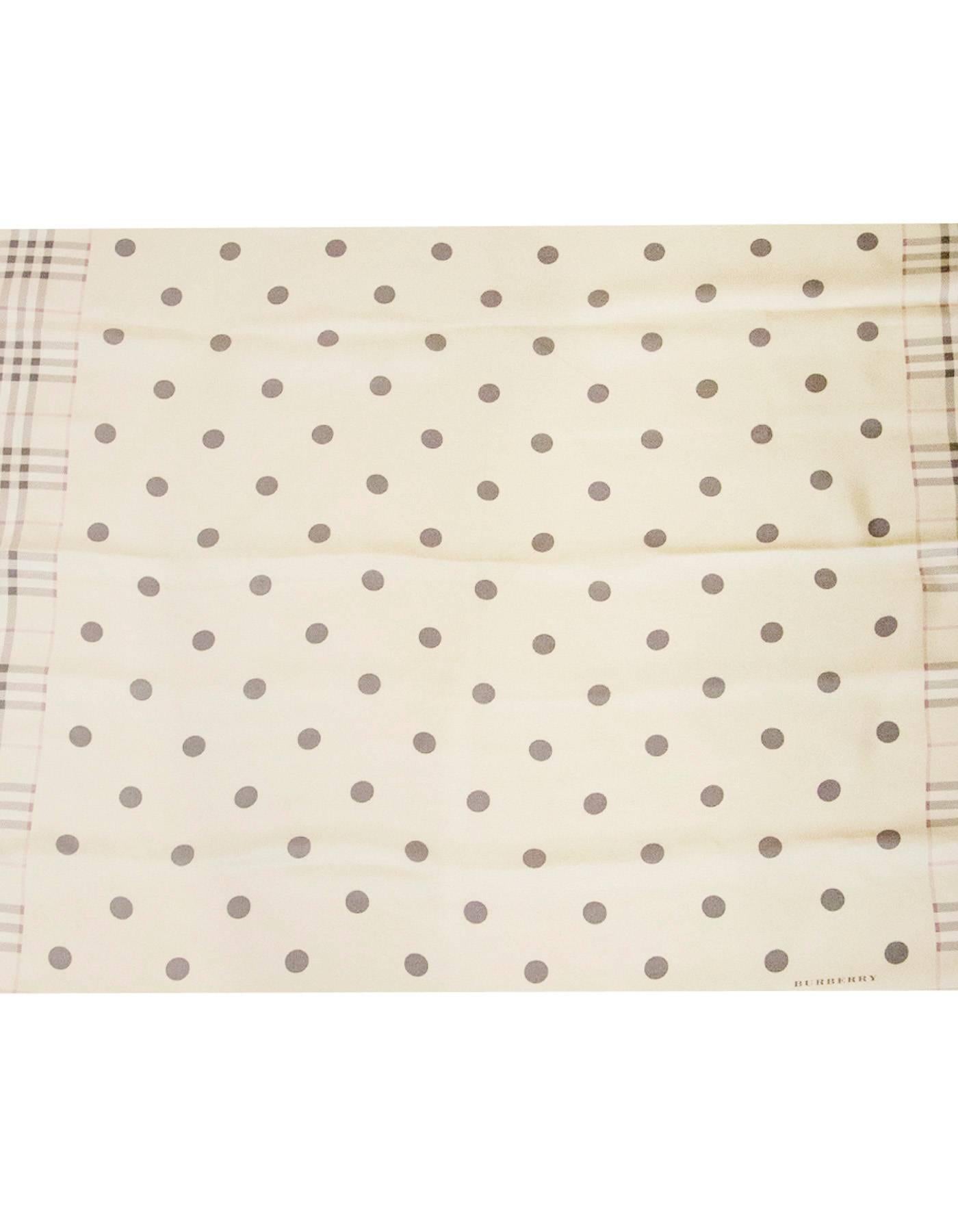 Burberry Pastel Polka Dot & Nova Plaid Silk Scarf

Made In: Italy
Color: Cream, pastel red and grey
Composition: 100% silk
Overall Condition: Excellent pre-owned condition with the exception of a few small pulls throughout as well as a few faint
