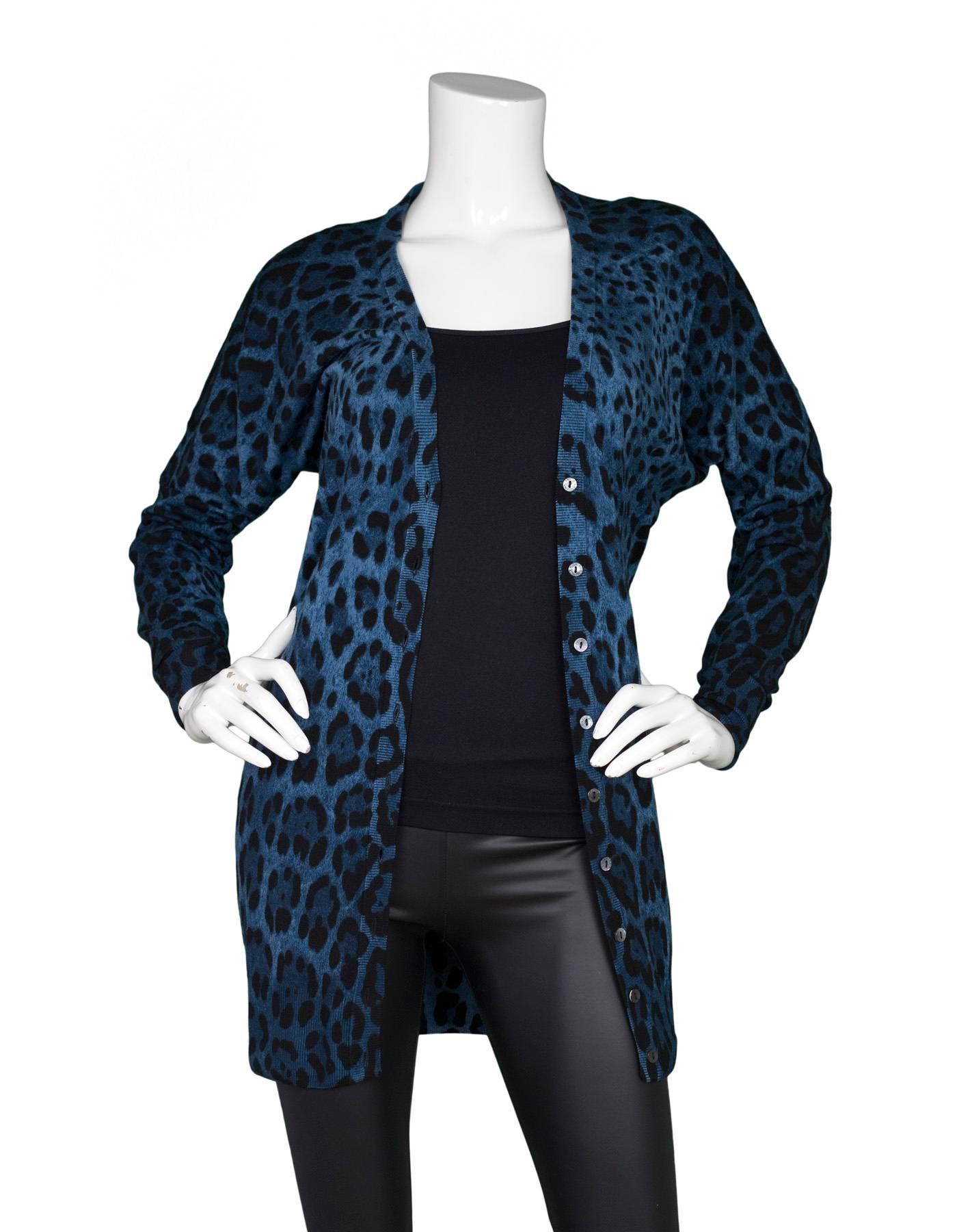 Dolce & Gabbana Blue & Black Leopard Print Wool Cardigan

Made In: Italy
Color: Black and blue leopard print
Composition: 100% virgin wool
Lining: None
Closure/Opening: Button down front
Exterior Pockets: None
Interior Pockets: None
Overall