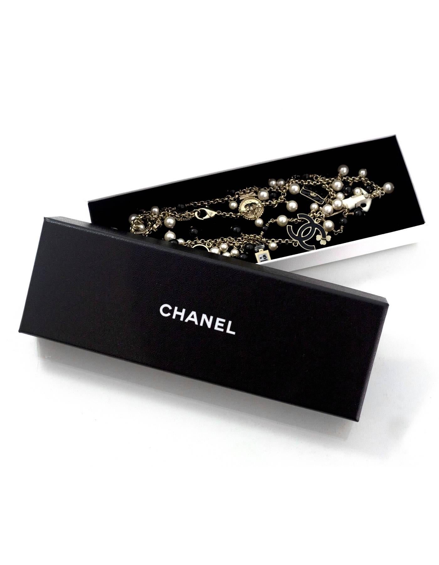 pearl necklace with chanel charm