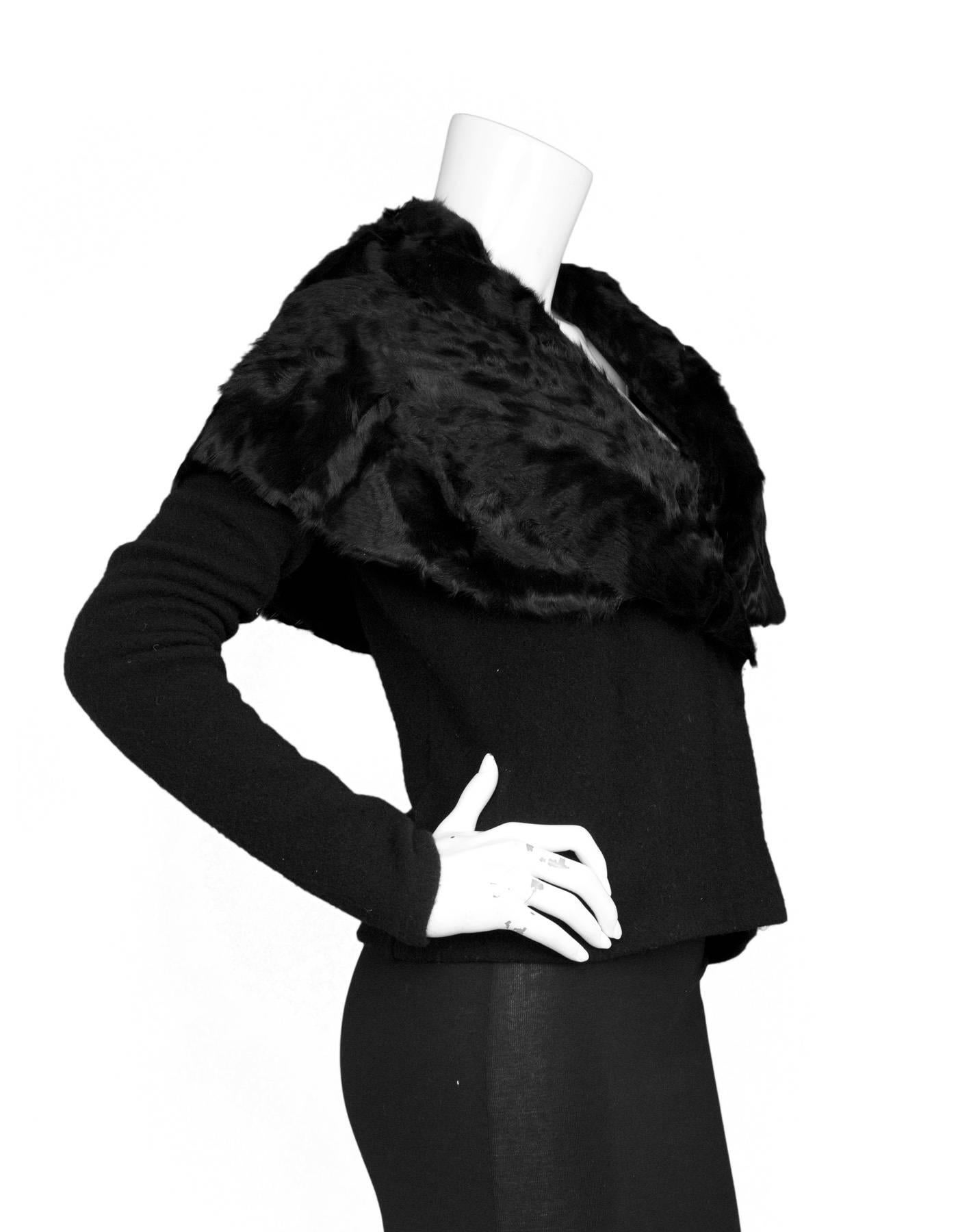 Ralph Lauren Black Cashmere & Fur Jacket 
Features fur shawl collar

Made In: Italy
Color: Black
Composition: 78% Wool, 22% cashmere
Lining: None
Closure/Opening: Double breasted snap closure
Exterior Pockets: None
Interior Pockets: None
Retail