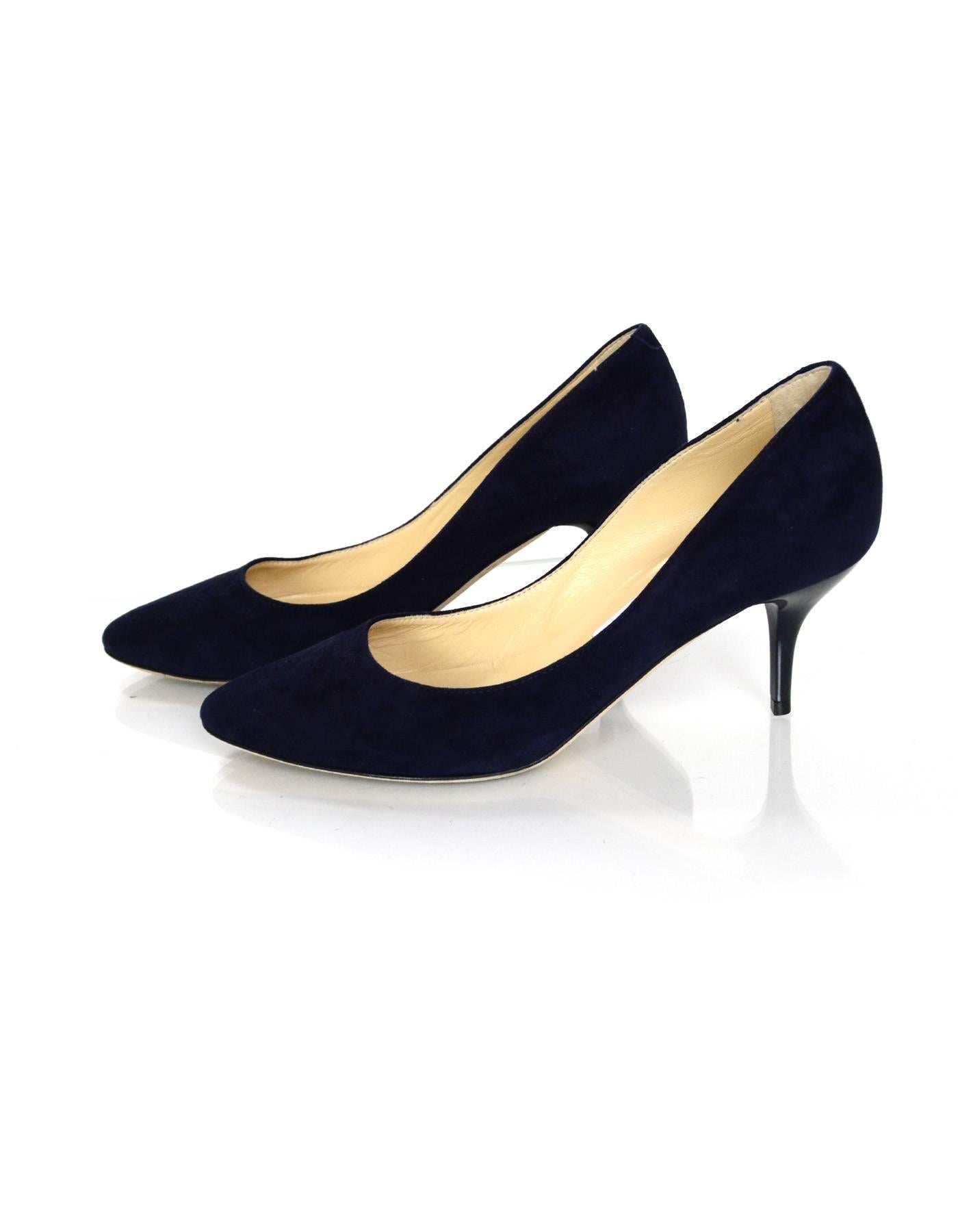 Jimmy Choo Navy Suede Pumps
Features navy shiny enamel heel

Made In: Italy
Color: Navy
Materials: Suede and enamel
Closure/Opening: Slip on
Sole Stamp: Jimmy Choo London Made in Italy 36
Overall Condition: Excellent pre-owned condition with the