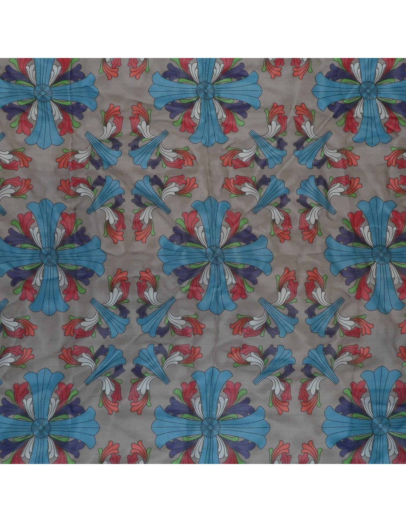 100% Authentic Chrome Hearts Grey Silk Scarf features green, blue, red, orange, and white cross print throughout.

Made In: France
Color: Grey with red, orange, white, green and blue
Composition: 100% Silk
Overall Condition: Excellent
Measurements: