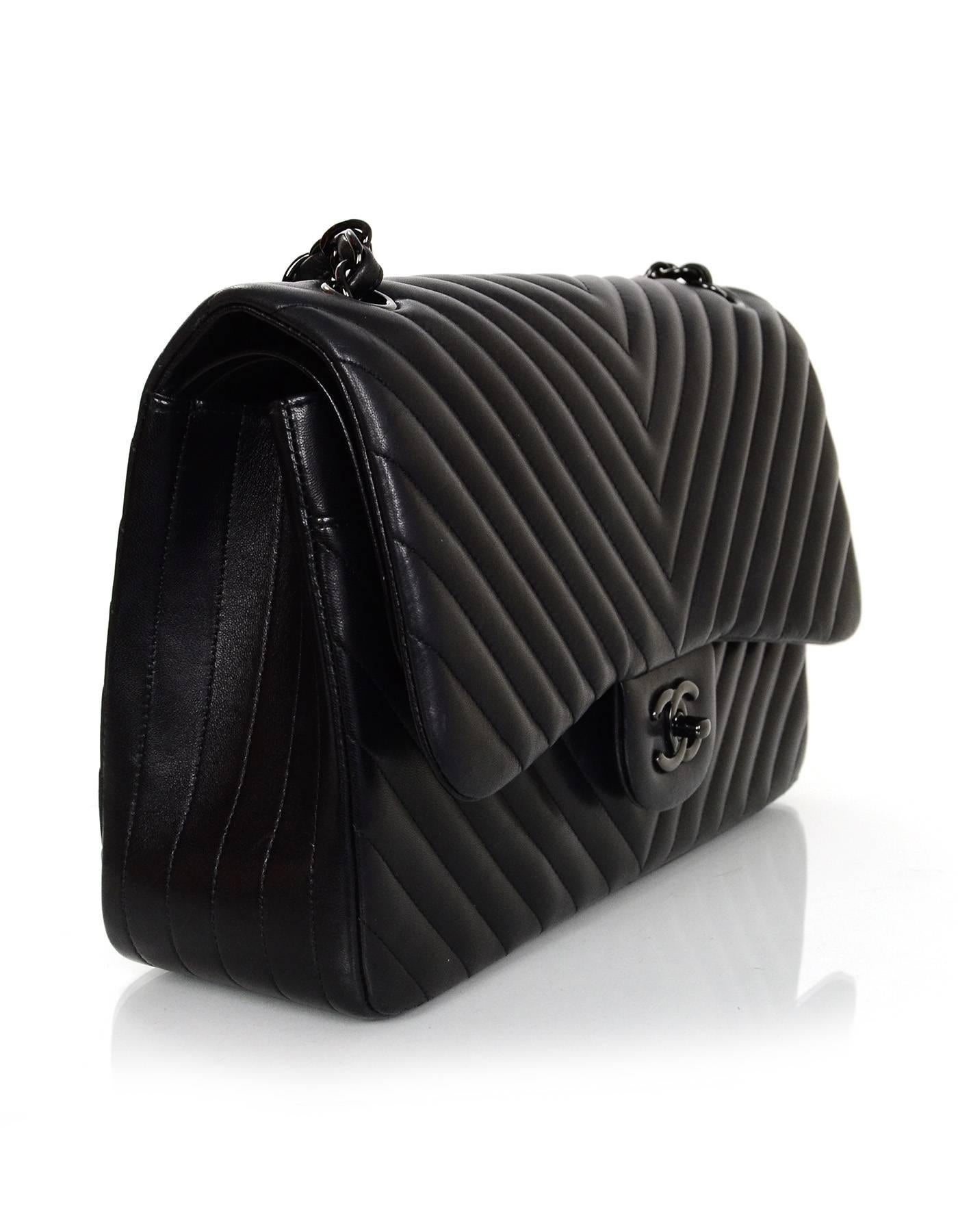 100% Authentic Chanel Chevron SO Black Double Flap Classic Jumbo. This bag is sold out everywhere and is perfect for any Chanel lover or collector. Features chevron quilted lambskin leather with black hardware.

Made In: France
Year of Production: