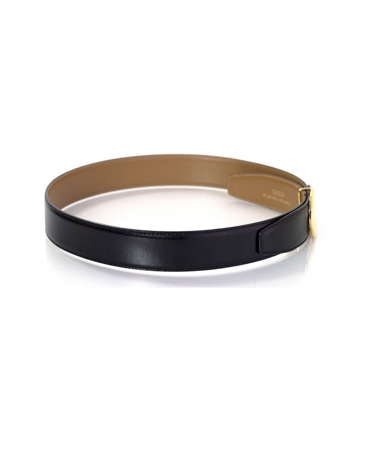 Gucci Black Leather Belt 
Features goldtone G buckle

Made In: Italy
Color: Black
Hardware: Goldtone
Materials: Leather
Closure/Opening: Stud and notch closure
Stamp: 75.30.036.1406.0956
Overall Condition: Excellent pre-owned condition with the