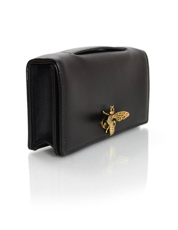 Dior bee clutch