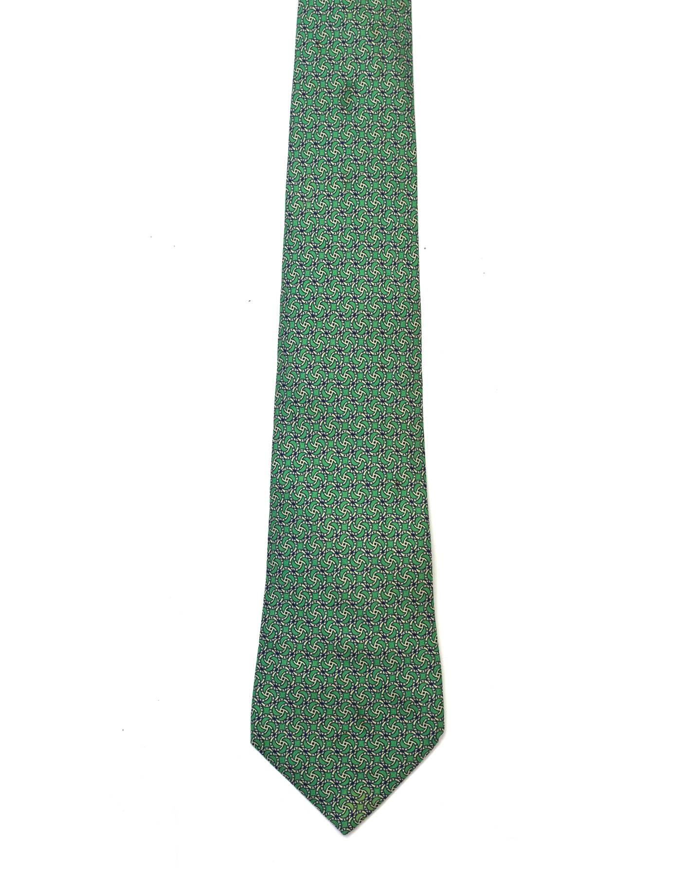 Hermes Green Printed Silk Tie

Made In: France
Color: Green and white
Composition: 100% silk
Overall Condition: Excellent pre-owned condition with the exception of a small light patch at tip of tie and a small soiling spot (ref image)
Measurements: