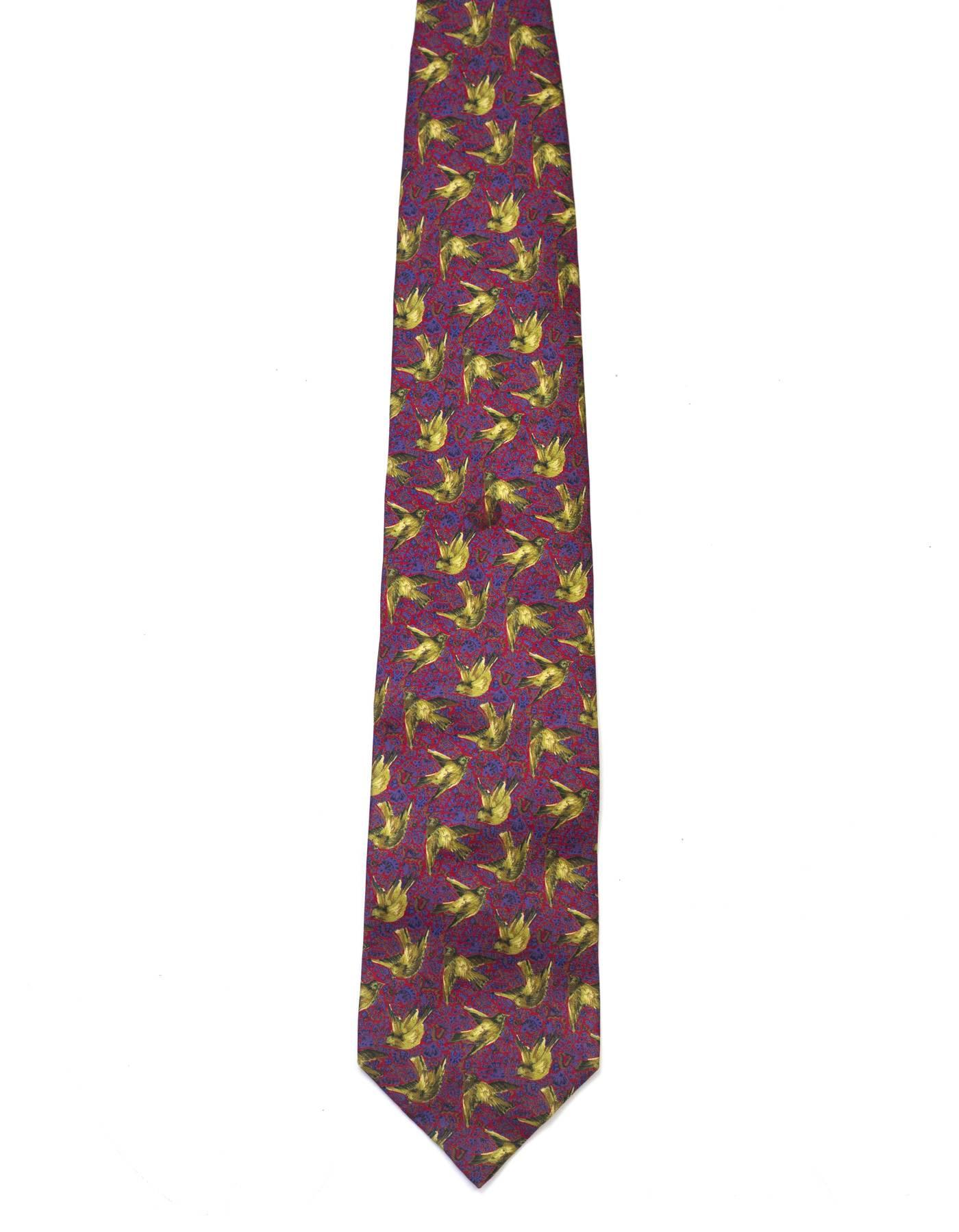 Bottega Veneta Bird Print Silk Tie
Features red and blue speckled background with yellow birds printed throughout

Made In: Italy
Color: Red, blue and yellow
Composition: 100% silk
Overall Condition: Excellent pre-owned condition with the exception