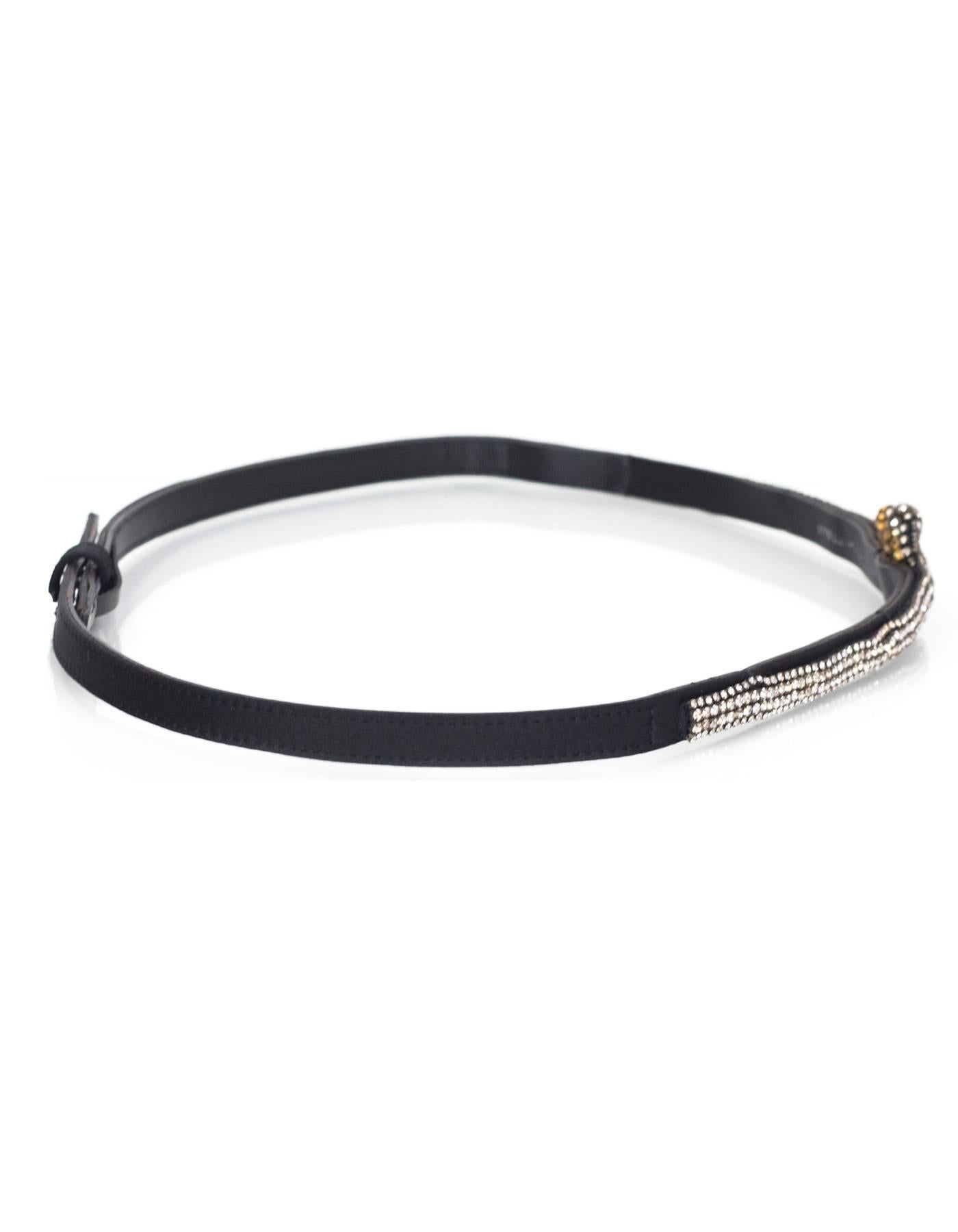 Stella McCartney Black Satin & Crystal Belt 
Features crystals that go into knot detail at center of belt

Made In: Italy
Color: Black and clear
Materials: Satin, leather and crystal
Closure/Opening: Triple snap closure
Overall Condition: Very