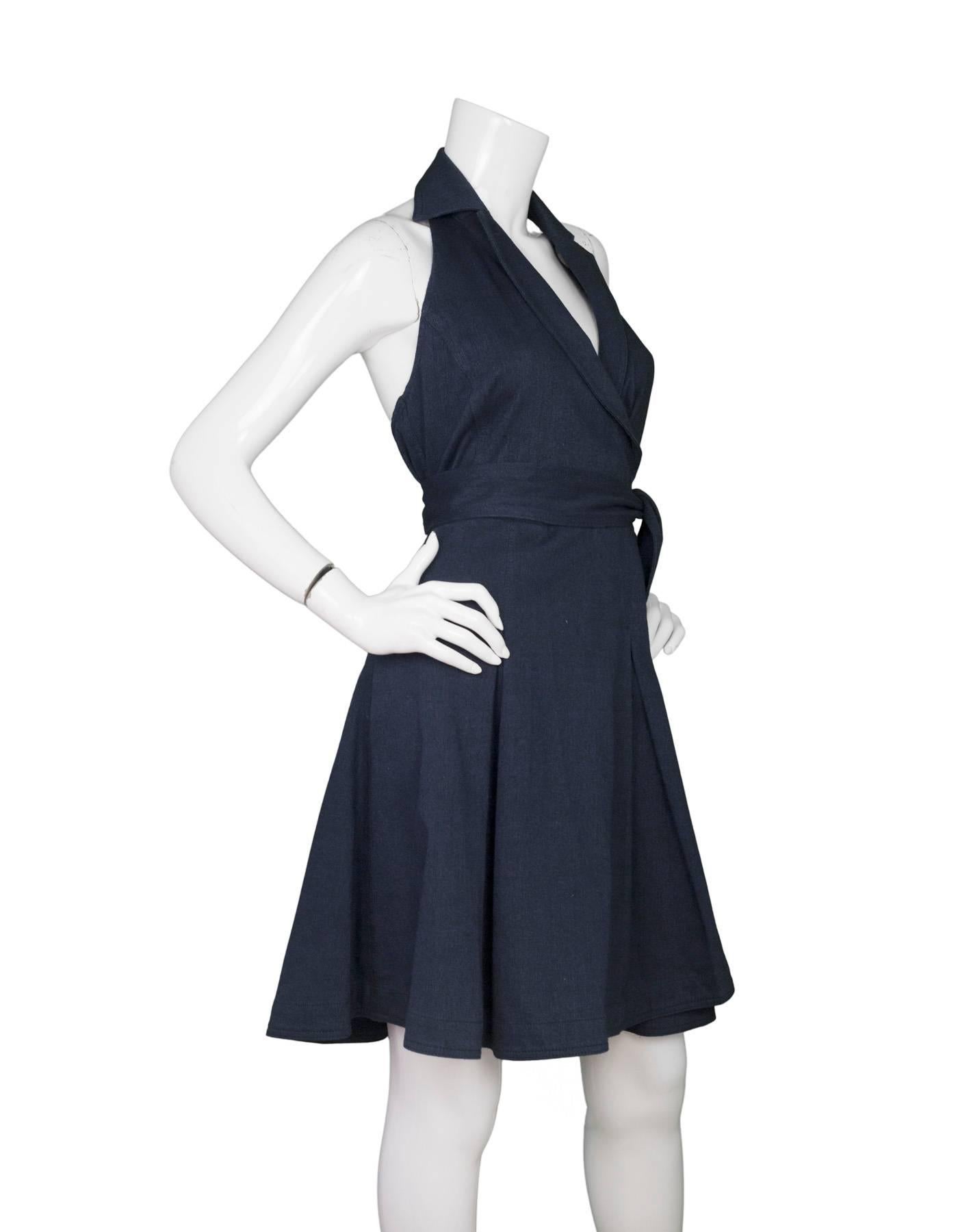 DVF NEW Blue Denim Halter Wrap Dress 

Made In: China
Color: Indigo blue
Composition: 93% cotton, 7% elastane
Lining: None
Closure/Opening: Wrap style closure
Exterior Pockets: Two pockets
Interior Pockets: None
Retail Price: $450 + tax
Overall