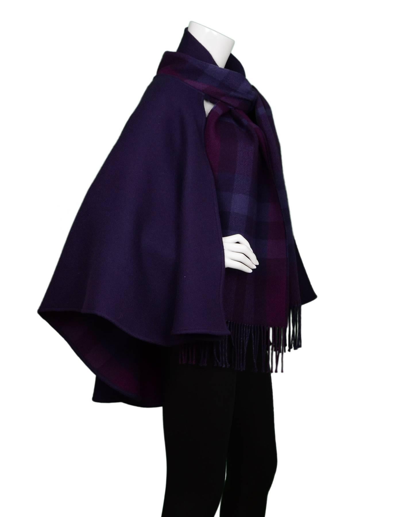 Burberry Purple & Nova Print Wool Cape 
Features attached fringe scarf

Color: Purple and magenta
Composition: Not given- believed to be a wool and cashmere-blend
Closure/Opening: None- can use scarf to tie at neckline
Overall Condition: