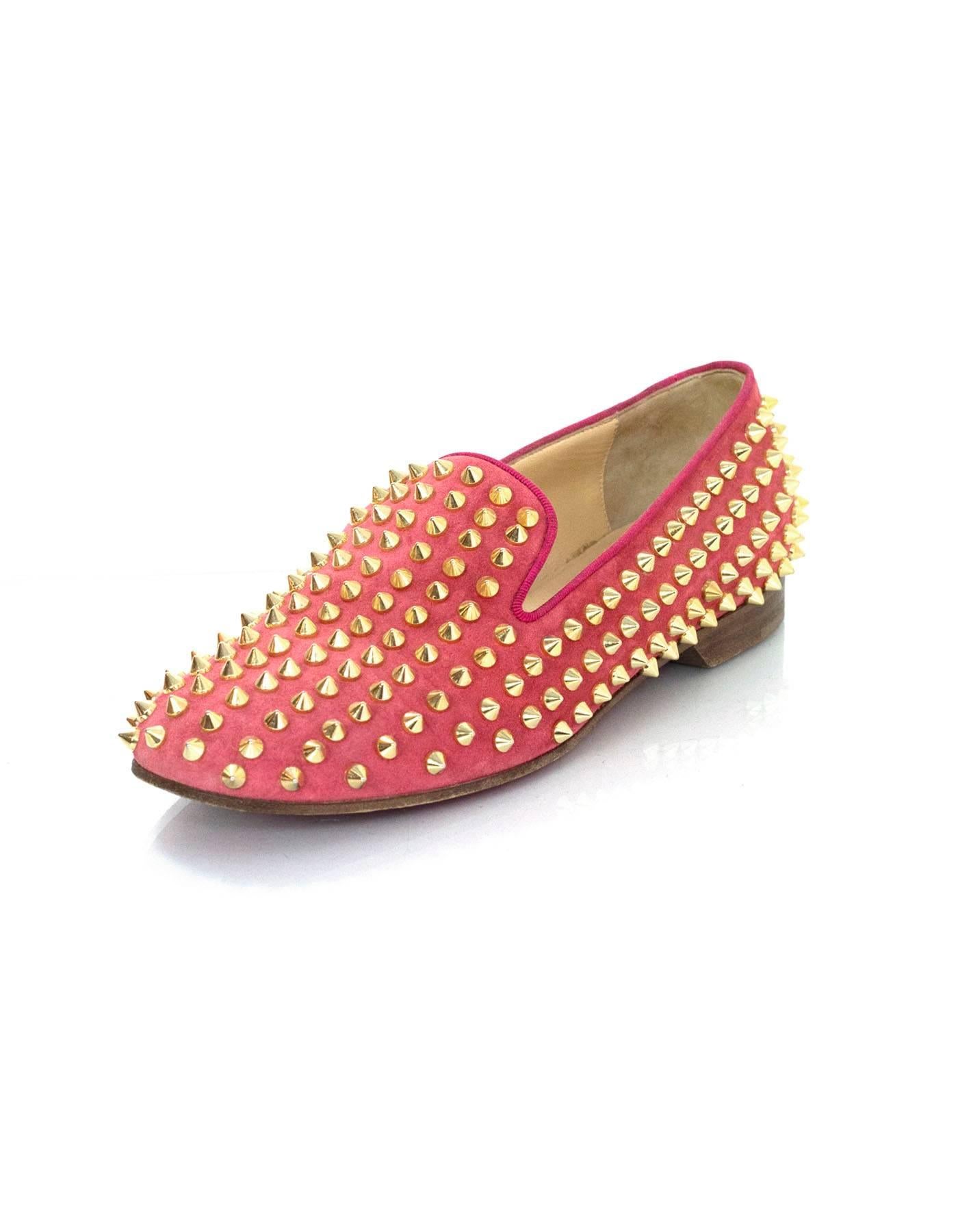 Christian Louboutin Coral Suede Rolling Spike Loafers sz 37.5.  
Features coral suede and goldtone studding throughout

Made In: Italy
Color: Coral, goldtone
Closure/Opening: Slip on
Retail Price: $1,050 + tax
Sole Stamp: Christian Louboutin MADE IN