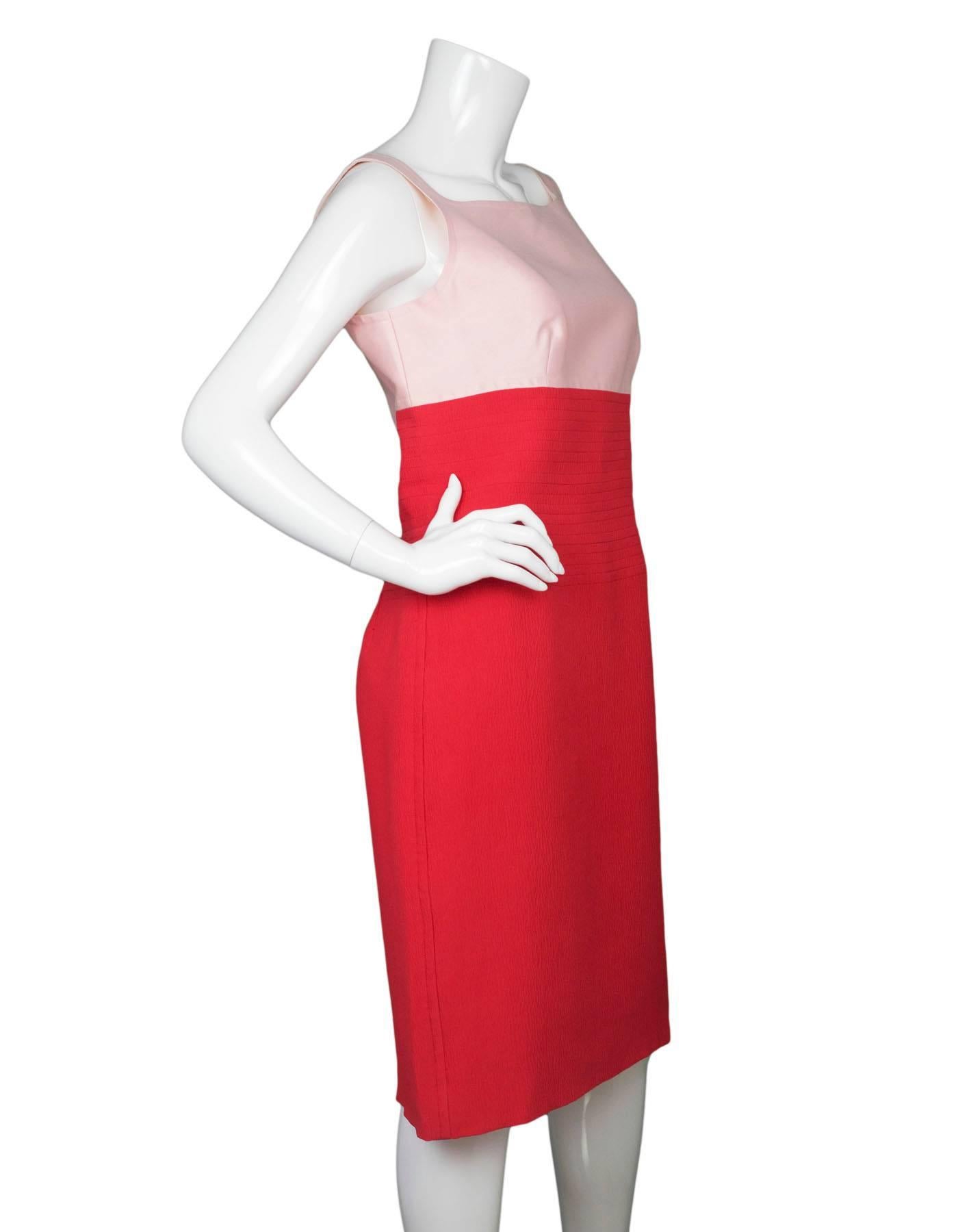 Oscar De La Renta Coral and Pink Dress Sz 12 NWT

From Spring 2009. Features empire waist and boat neckline.

Made In: USA
Color: Coral, pink
Composition: 93% Cotton, 7% Silk
Lining: Coral red silk
Closure/Opening: Back zip closure
Overall