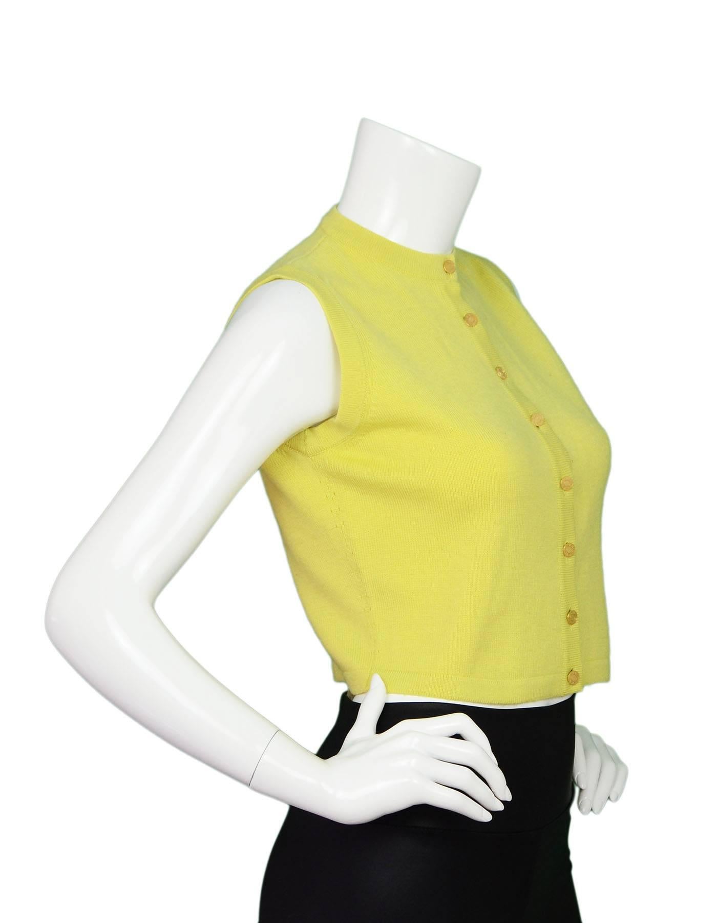 Hermes Yellow Chartruse Sleeveless Sweater Sz M

Color: Yellow
Composition: Not listed, feels like cashmere
Lining: None
Closure/Opening: Front button closure
Overall Condition: Very good pre-owned condition with the exception of slight pilling