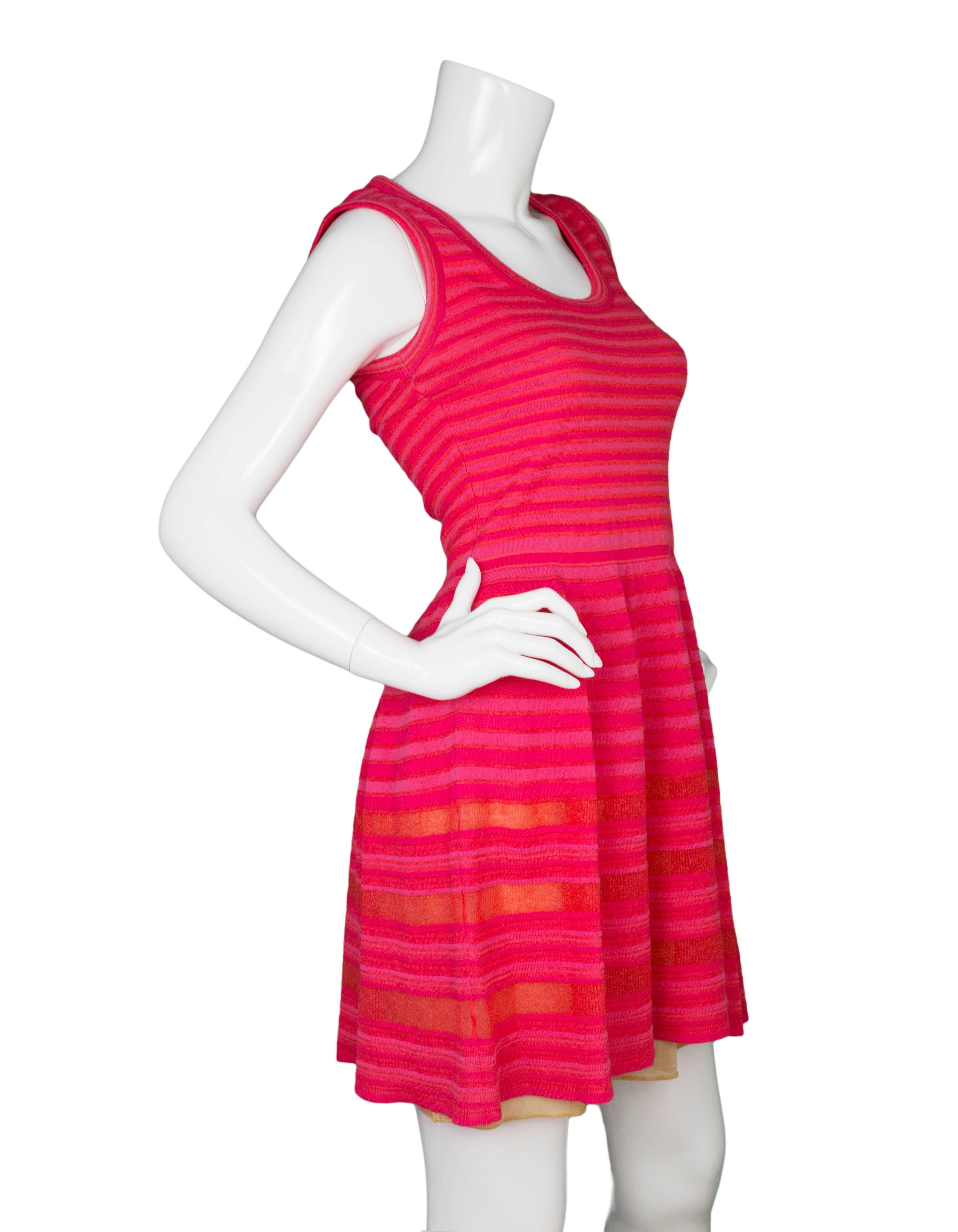 M Missoni Coral Sleeveless Fit Flare Dress
Features metallic stripes throughout 

Made In: Italy
Color: Coral
Composition: Not given- believed to be a poly-blend
Lining: Nude poly-blend
Closure/Opening: Pull over
Exterior Pockets: None
Interior