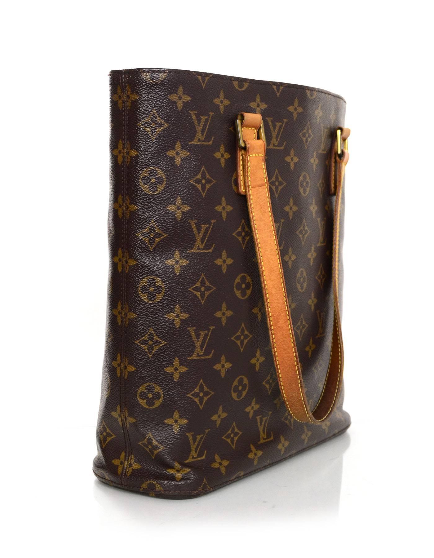 Louis Vuitton Monogram Vavin GM Tote

Made In: France
Year of Production: 2002
Color: Brown and tan
Hardware: Goldtone
Materials: Coated canvas, vachetta leather
Lining: Brown canvas
Closure/Opening: Open top
Exterior Pockets: None
Interior Pockets: