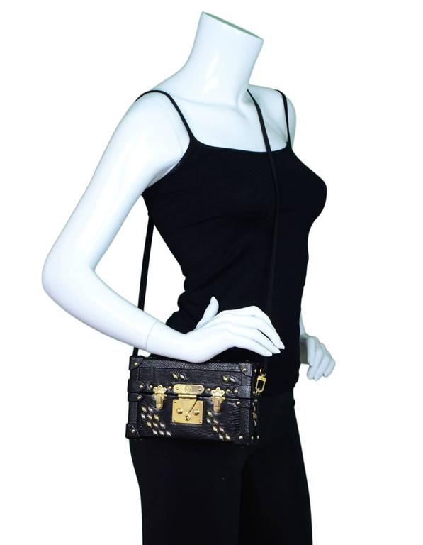 Louis Vuitton Petite Malle lizard Skin Box Bag.